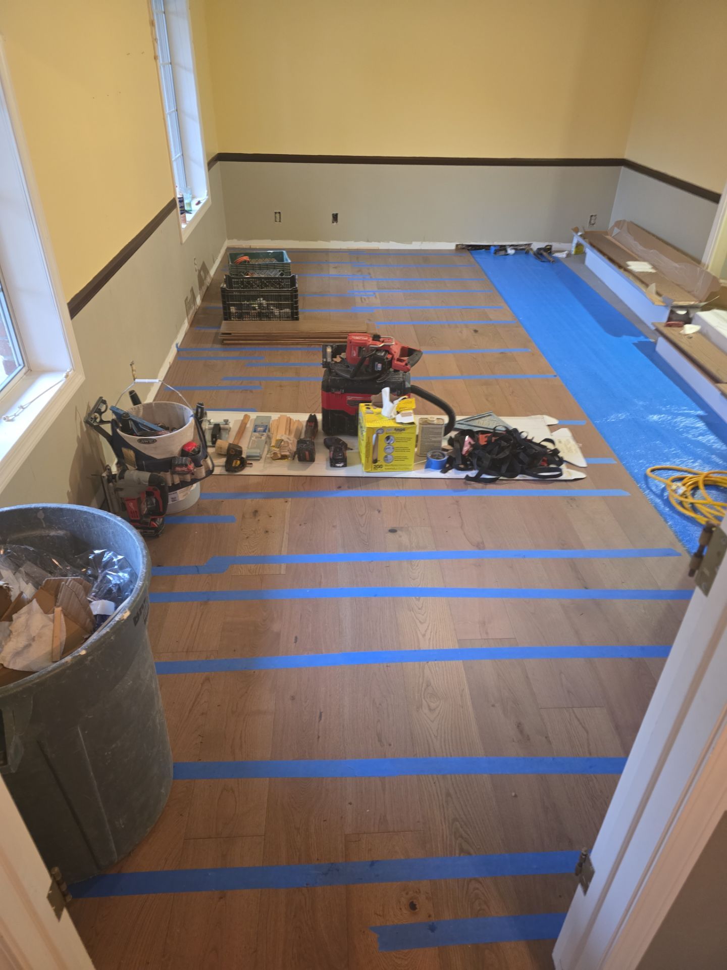 Engineered Wood Flooring Installation and Staircase Upgrade in Brookings by KMD Surfaces INC.