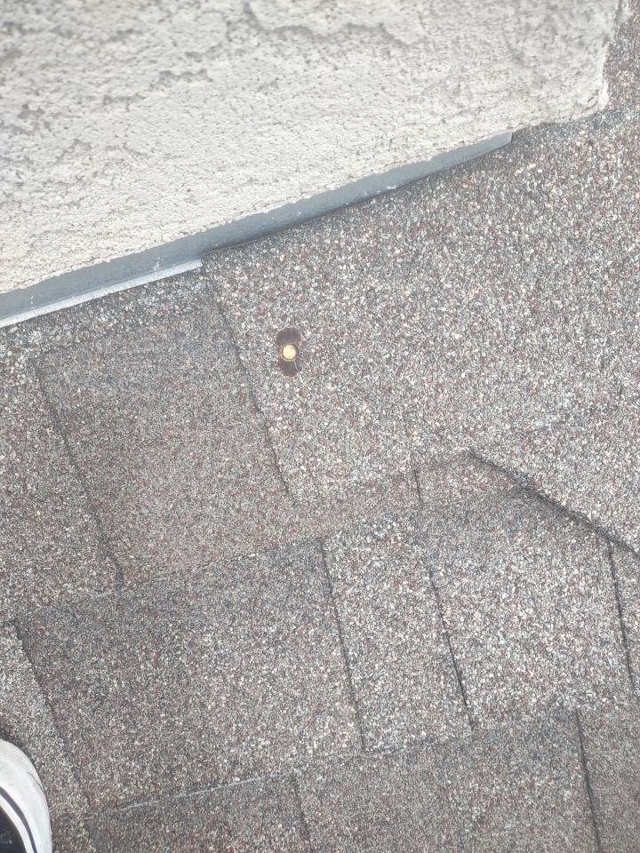 Roof Damage by Bros Roofing