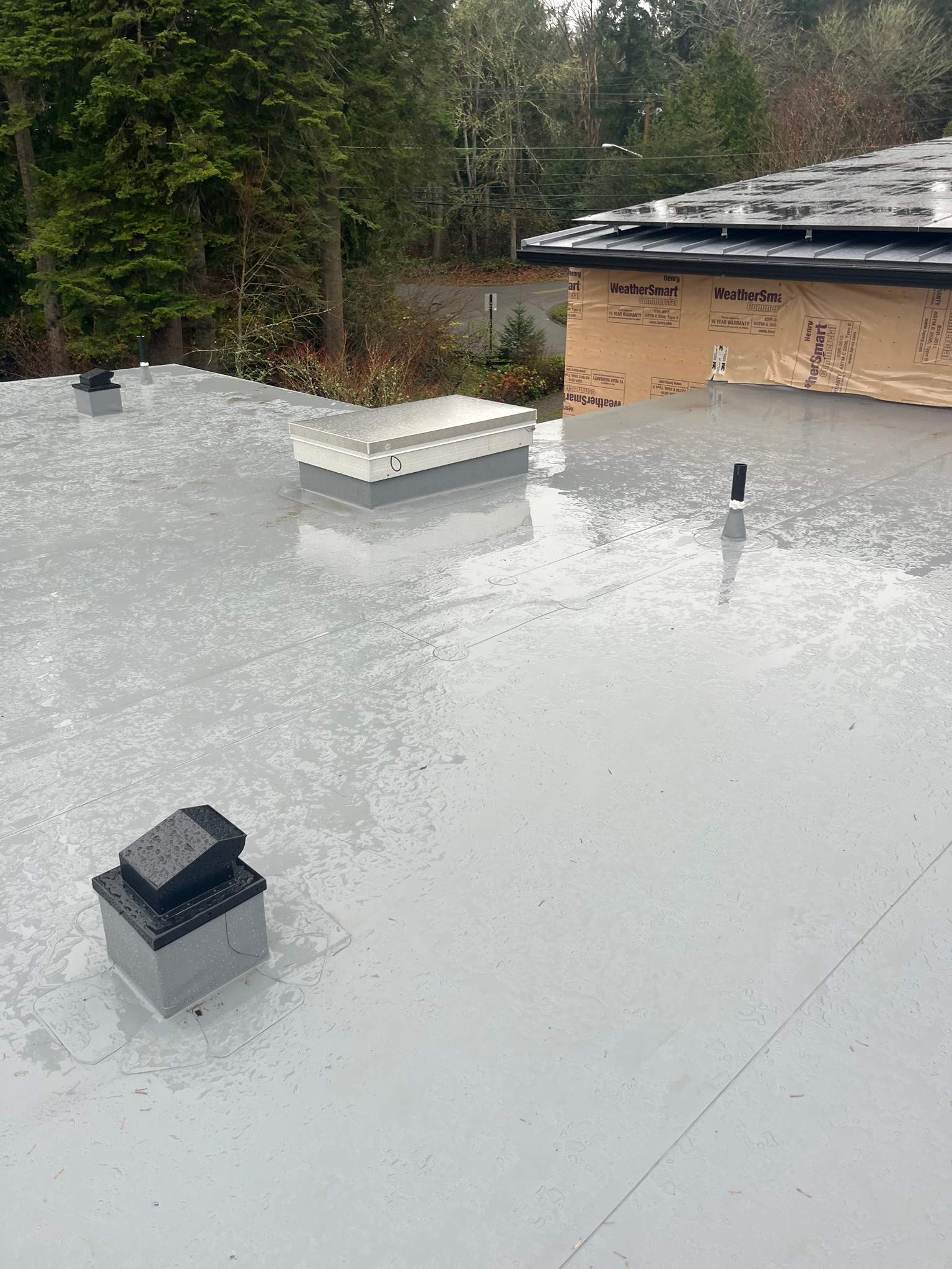 New Construction Roof Installation in Indianola, WA by Hanley Construction