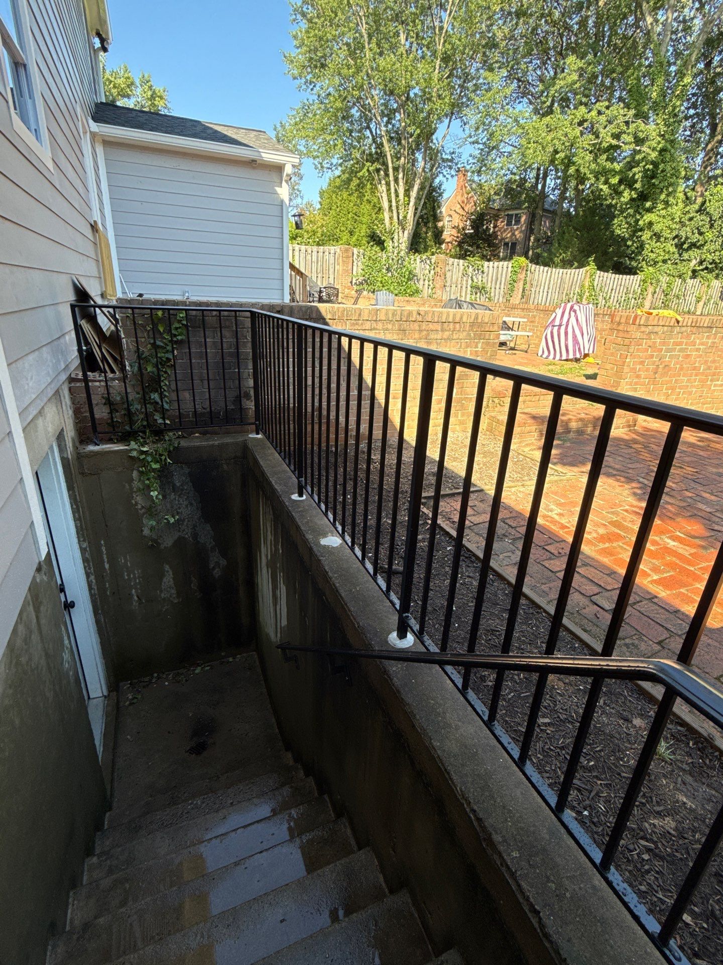 L-Shape Iron Railing & Integrated Safety Gate – Residential Exterior– McLean, VA by Capitol Iron Works