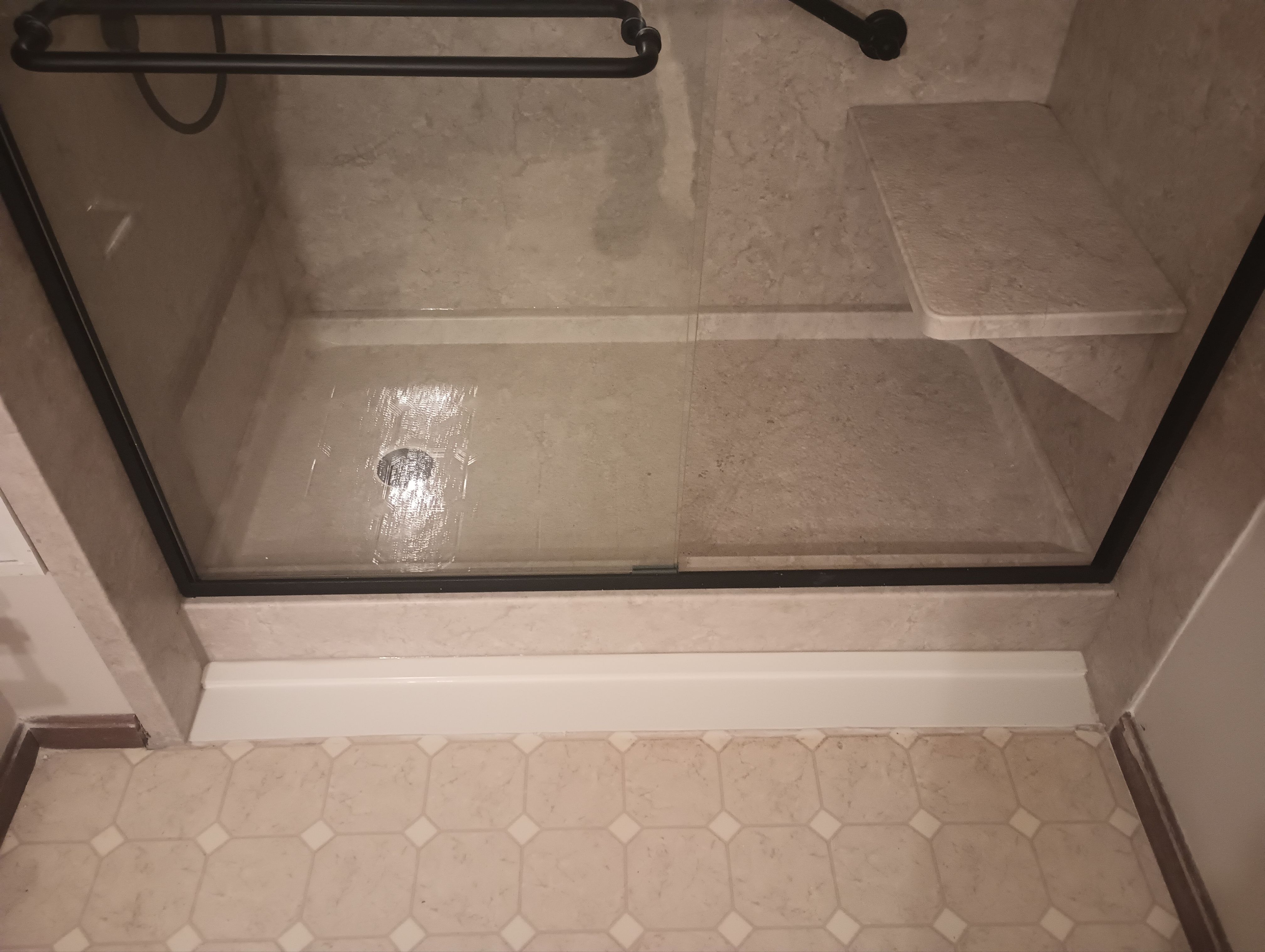 Tub to Shower Conversion using BCI Acrylic Shower System by Secure Construction Company Inc