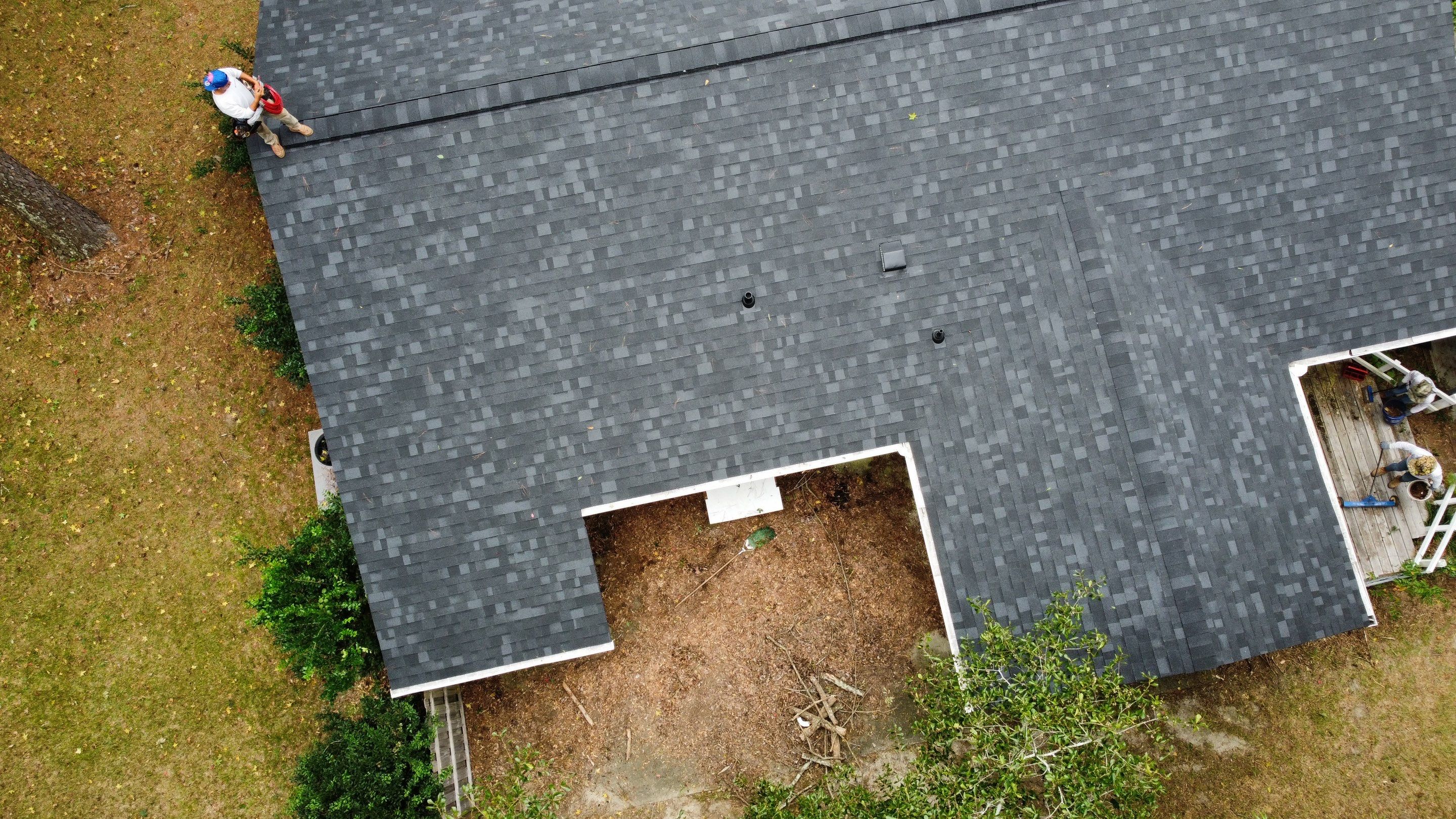 New Onyx Black Shingle Roof Replacement and Tree Damage Repair. by Midlands Roofing & Exteriors
