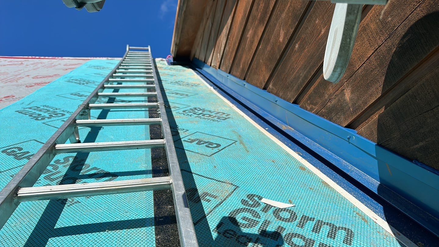 Residential Roofing Installation using Standing Seam Metal - Gallery Blue by RoofX 