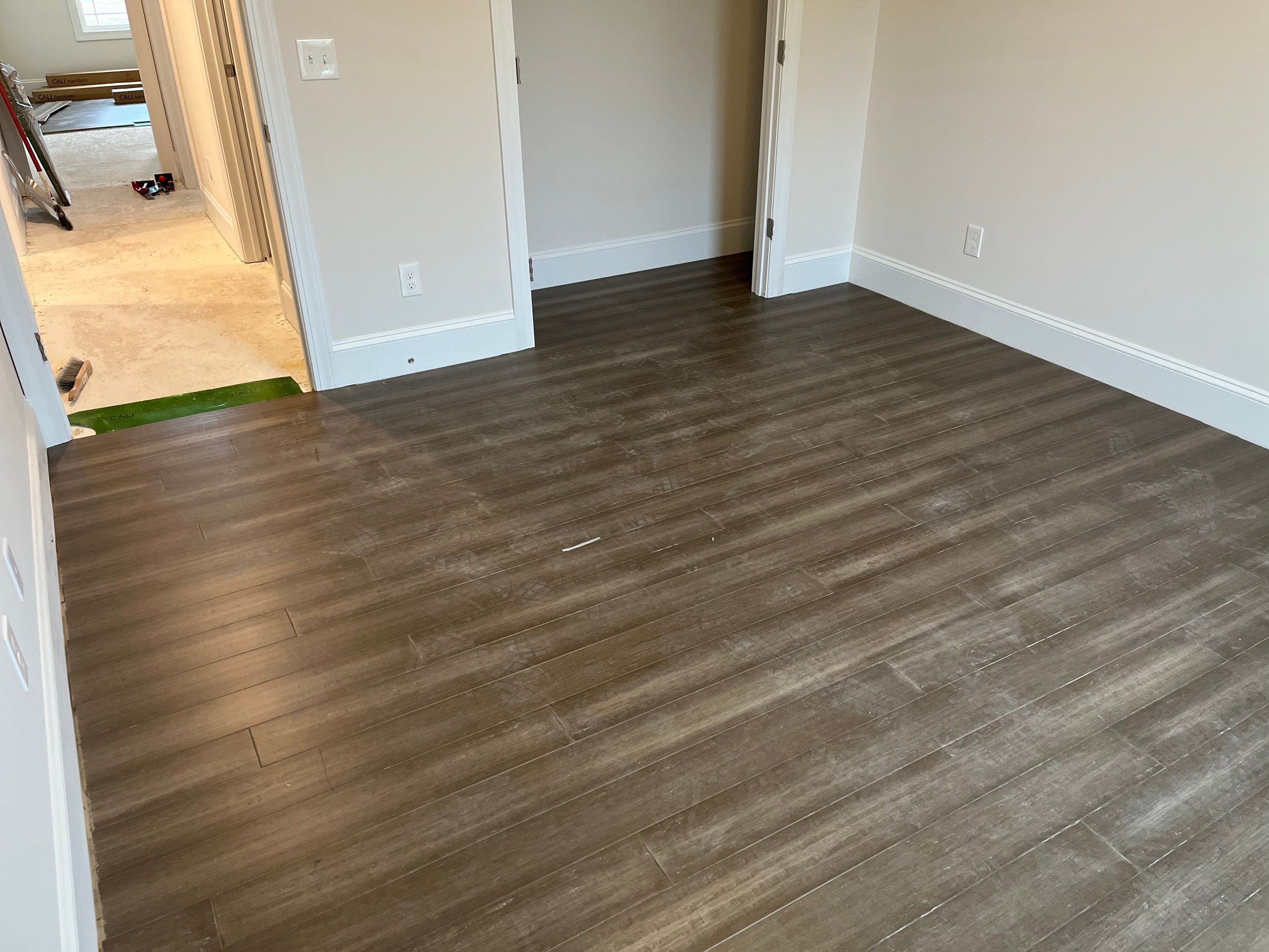 Interior Paint and Bamboo Flooring Install by Thompson Industrial
