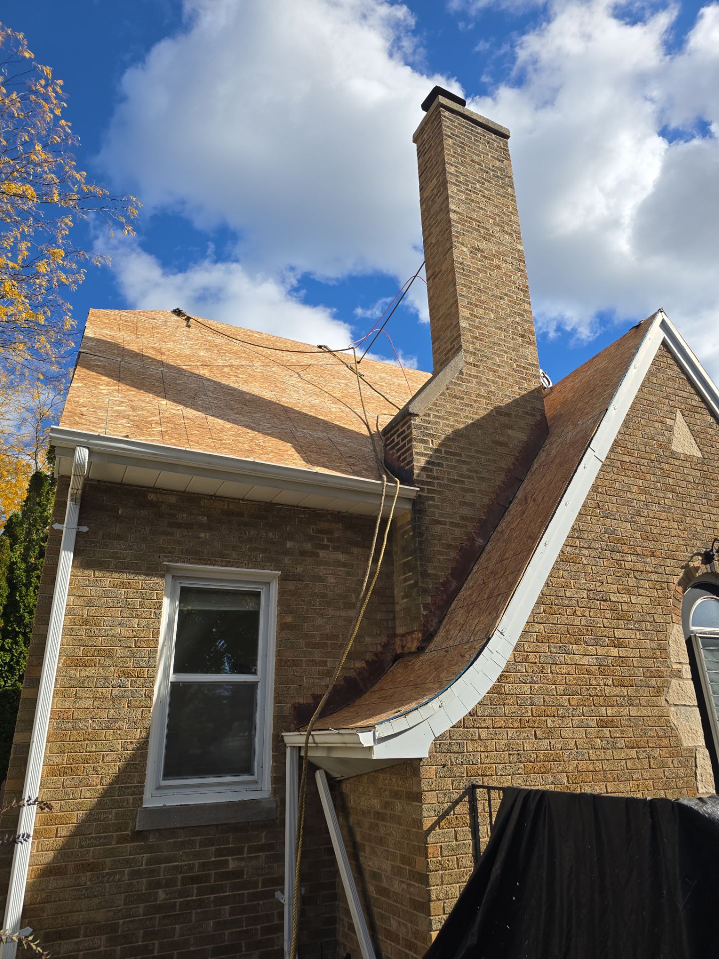 House, Garage, and Skylight Roof Replacement with GAF HDZ Charcoal Shingles and Gutter Protection by Gellings Roofing & Siding