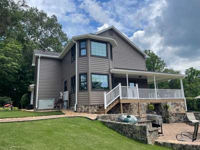 Exterior remodel including window replacement