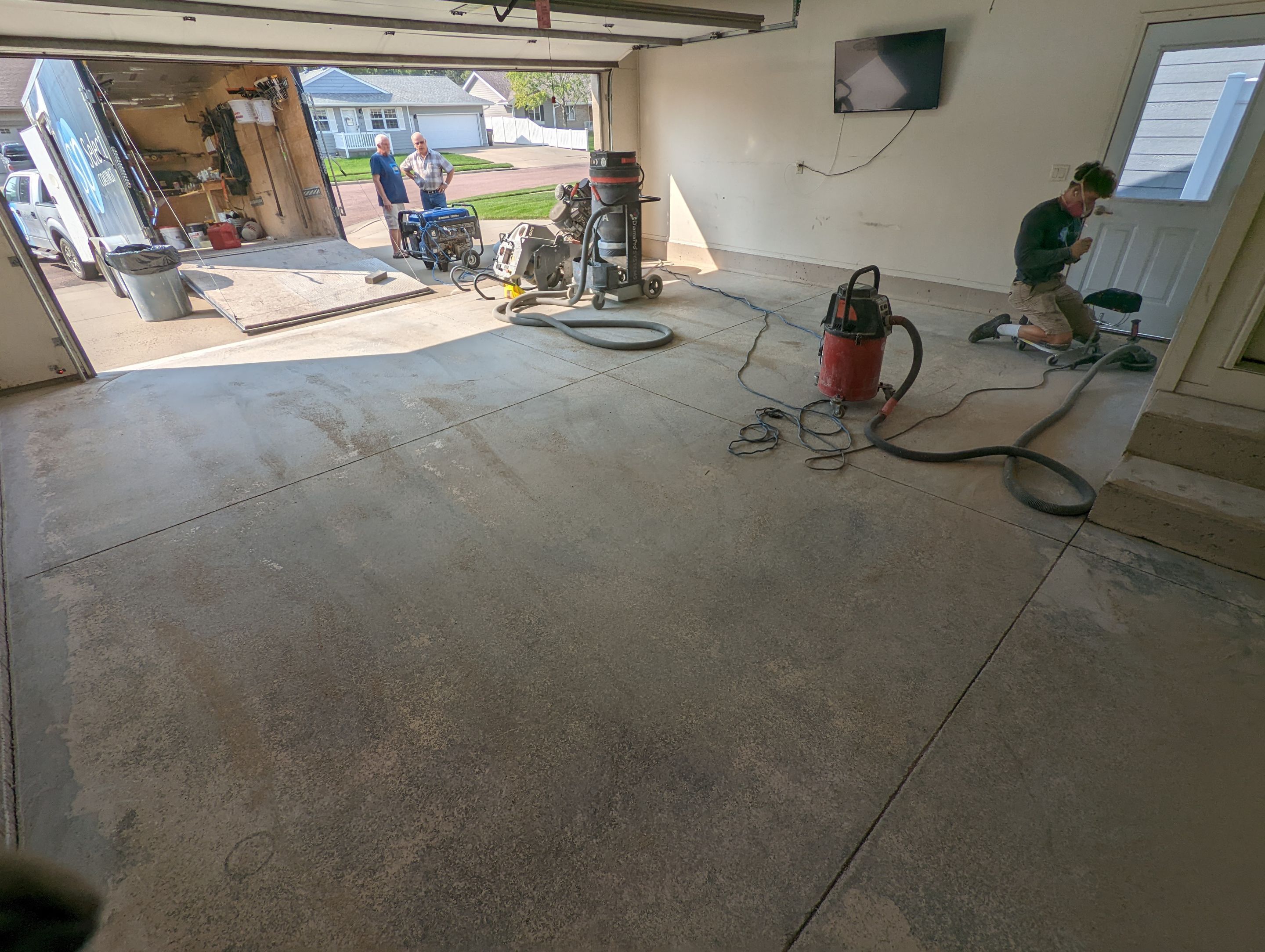 Garage using Mediterranean by Select Painting, Coatings & Garage Cabinets