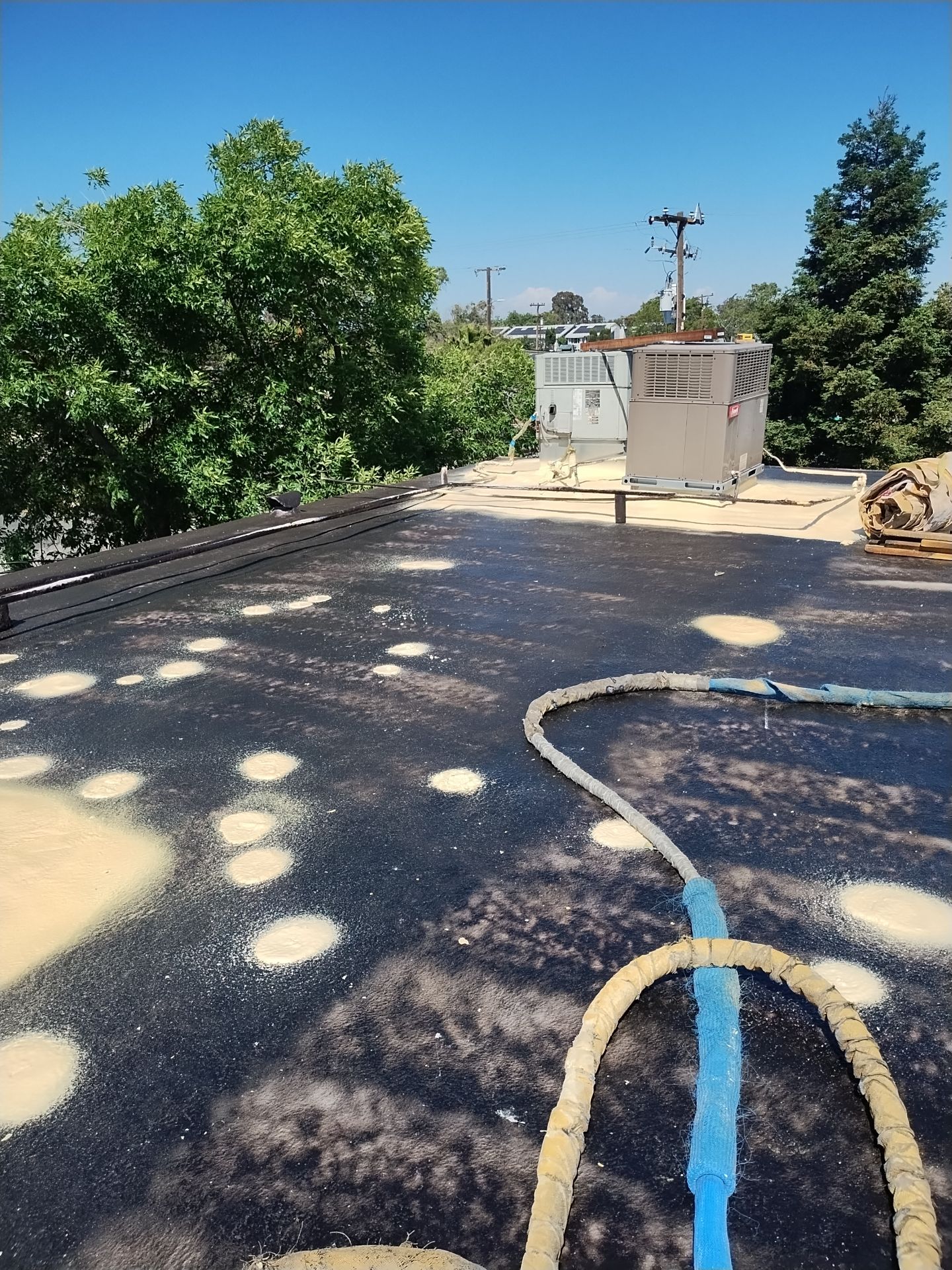 Foam Refurbish using General Coatings acrylic coatings and spray foam by Straight Edge Roofing Inc