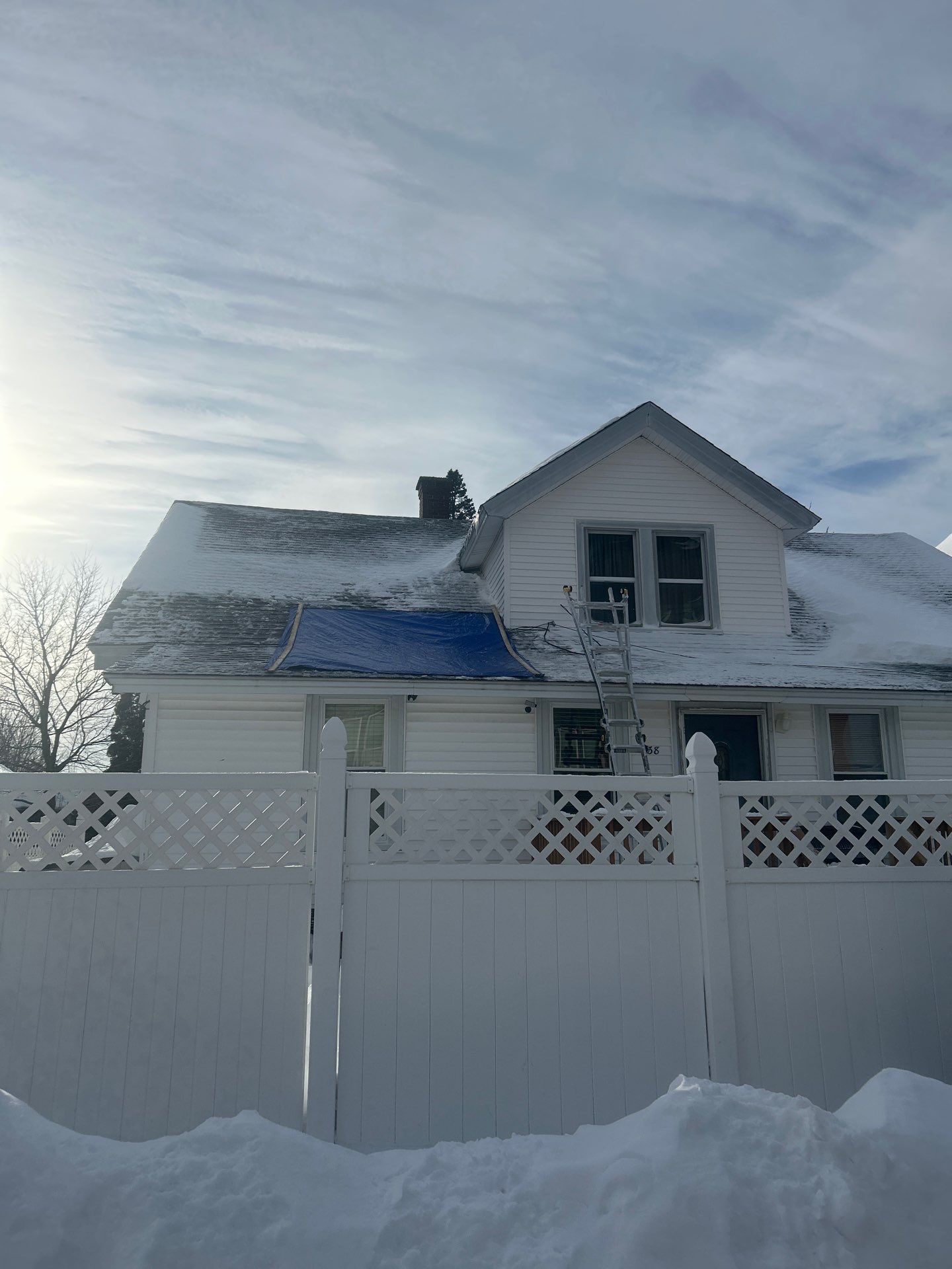 Emergency Snow Removal & Roof Tarp Installation in Lawrence, MA by Mighty Dog Roofing of Greater Middlesex County