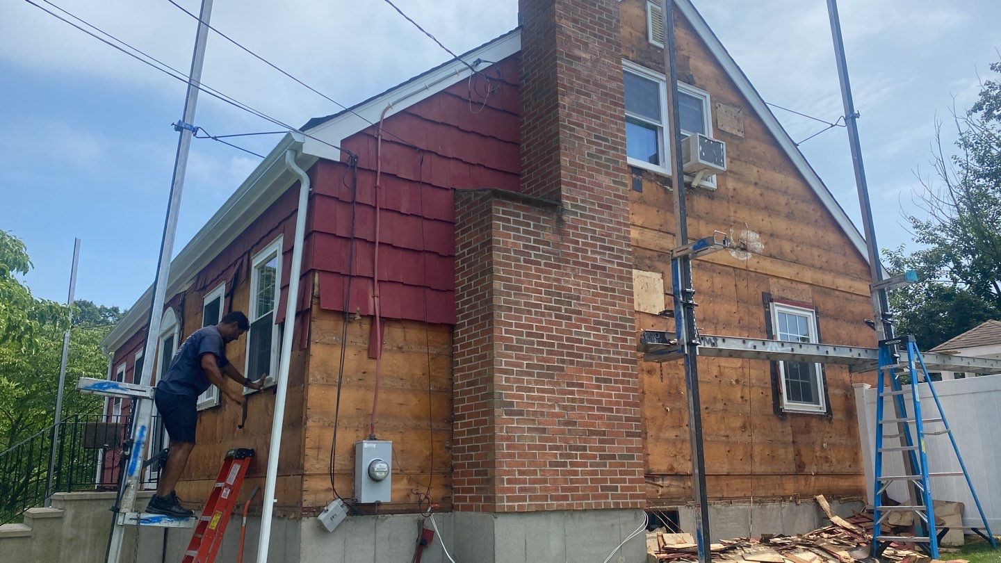 Siding Installation using Royal Building Products Rustic Red by A Plus Exterior