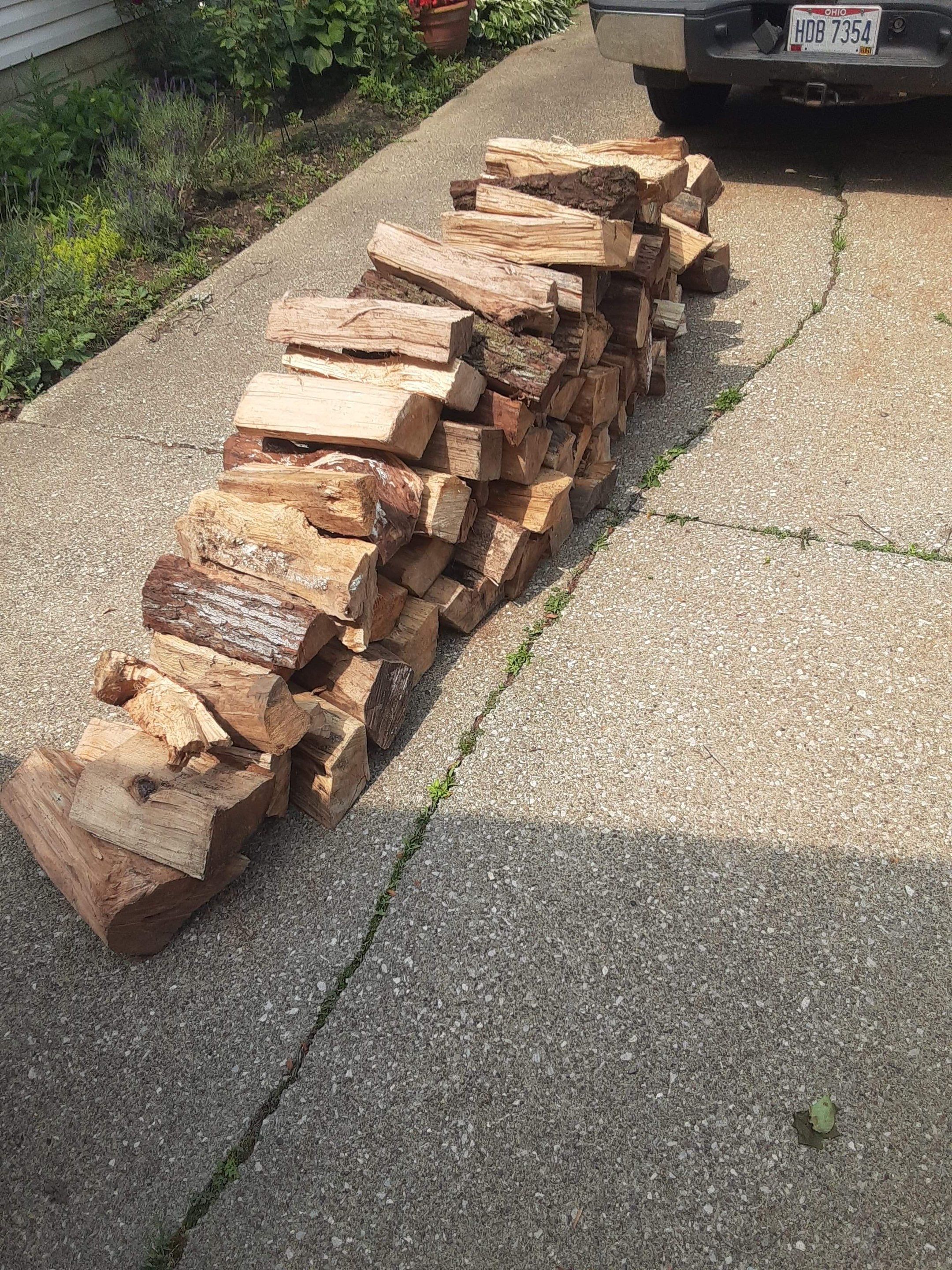 Firewood Delivery  using Seasoned Firewood by Mike Jones & Sons Tree Service LLC 