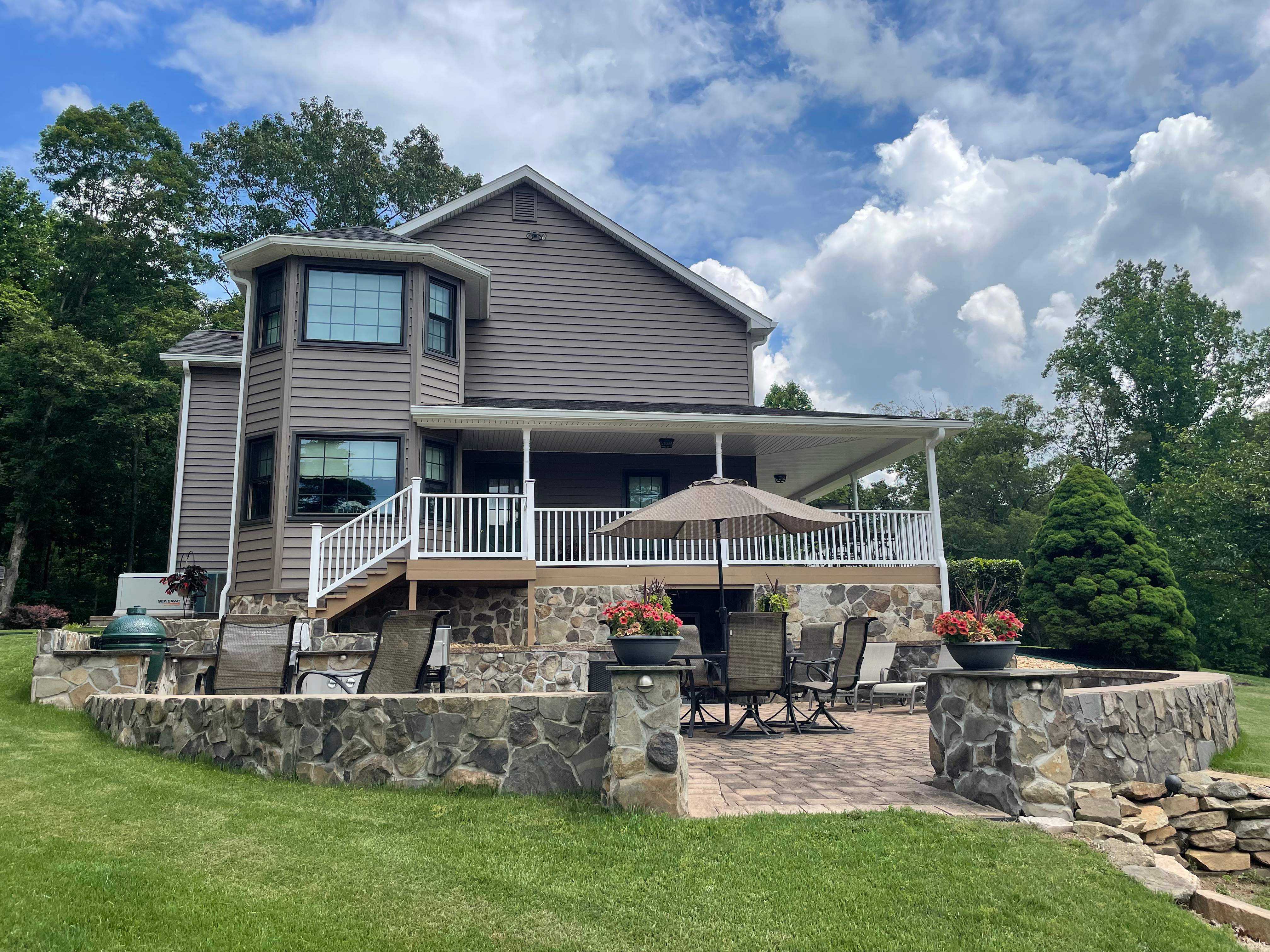 Exterior remodel including window replacement by American Home Contractors