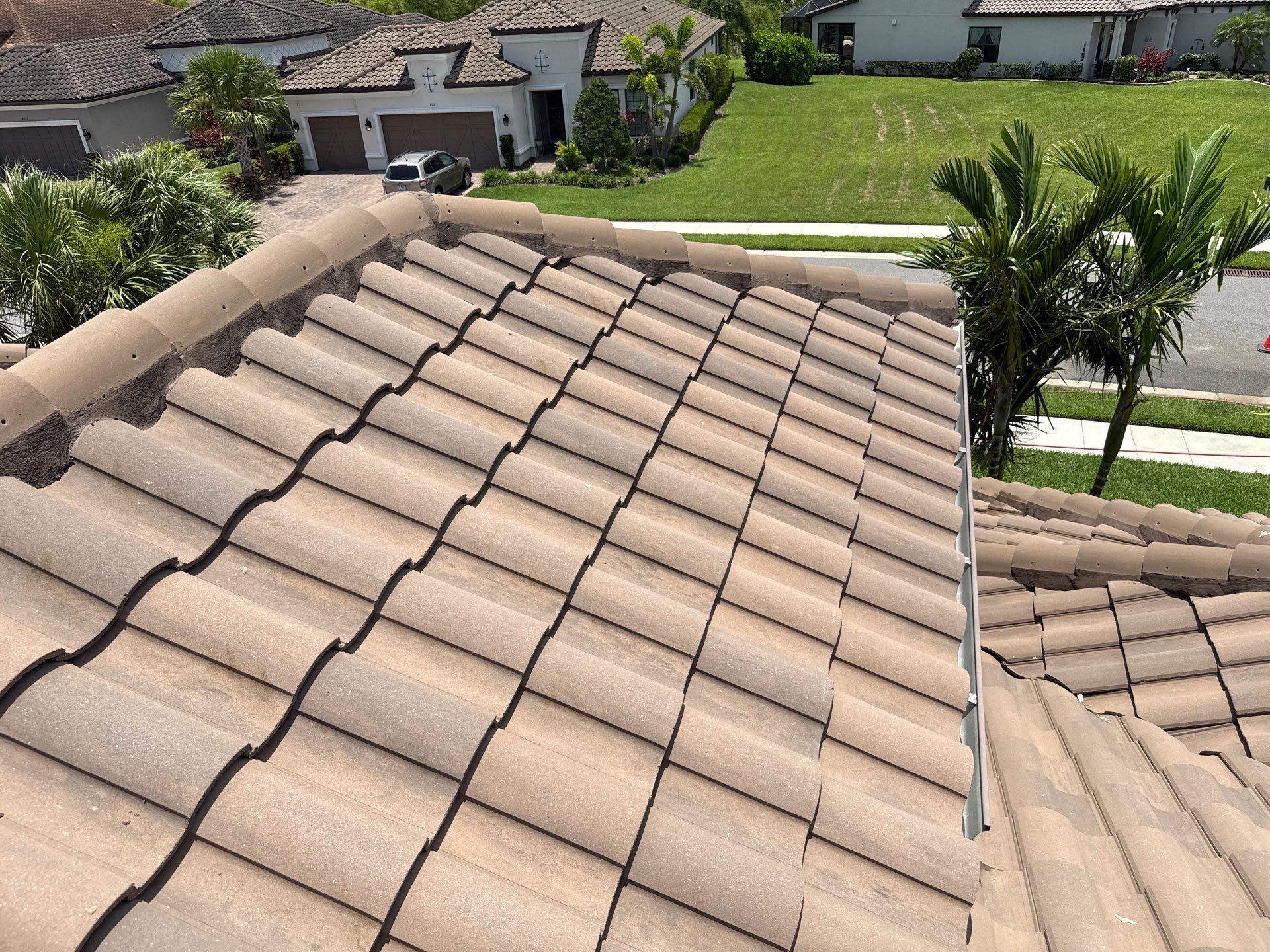Neighboring Tile Roof Cleaning with Gutter Runoff Control – Palmetto, FL by Sunshine AquaWash