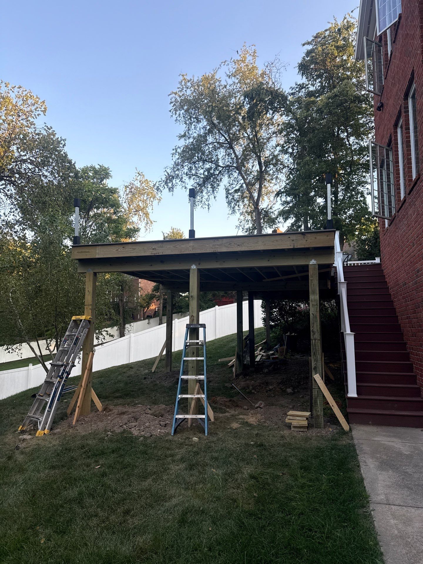 Deck extension  by Cousins Roofing Siding & Decks