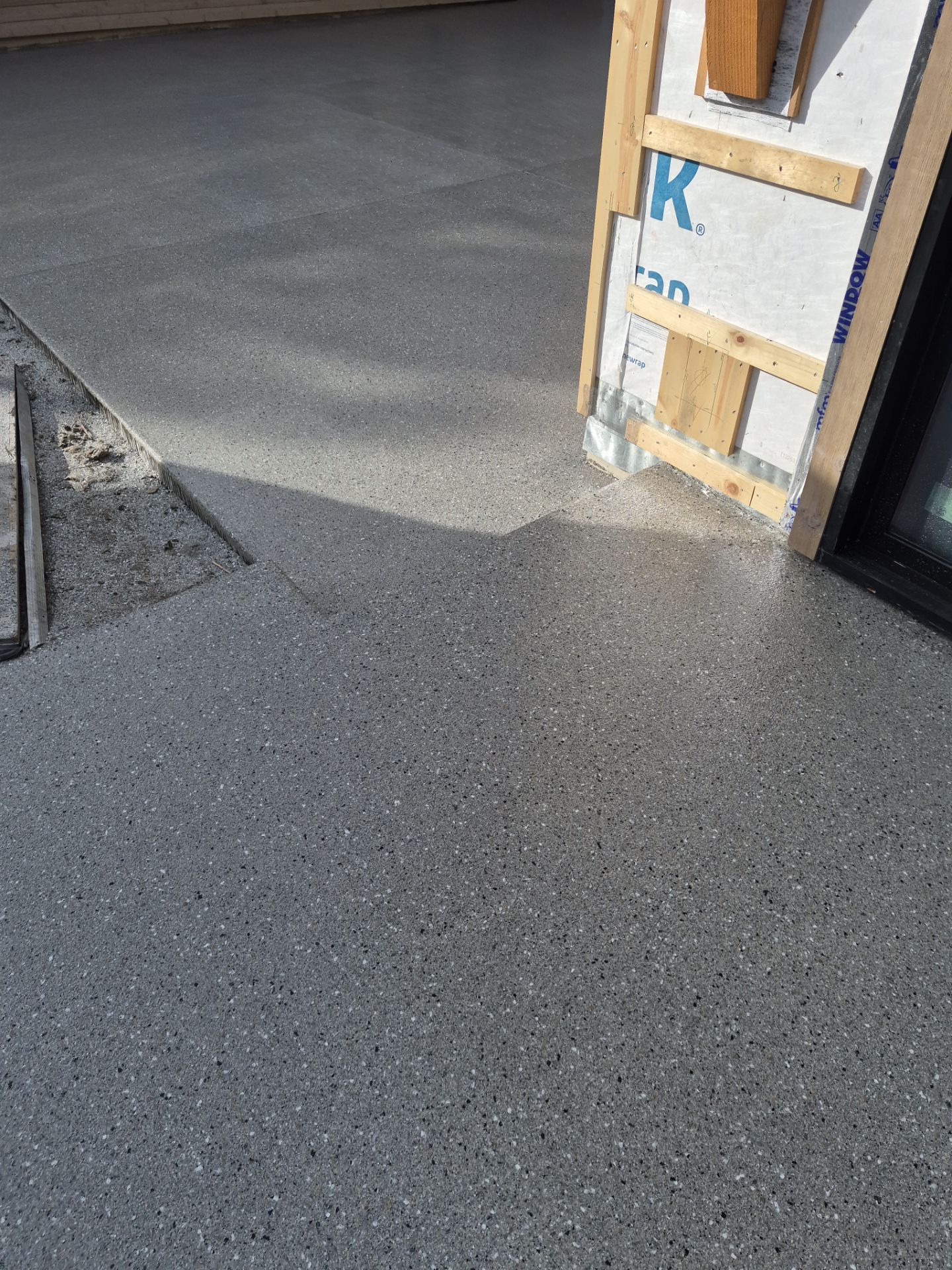 New Construction Concrete Patio and Garage Polyurea Floor Coating in Dover by Croc Coatings, LLC