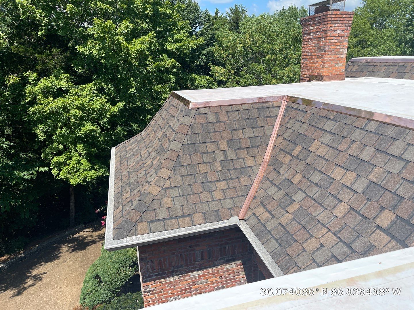 Residential Roofing Installation using Certainteed Belmont Shingles and TPO by Undersun Roofing 