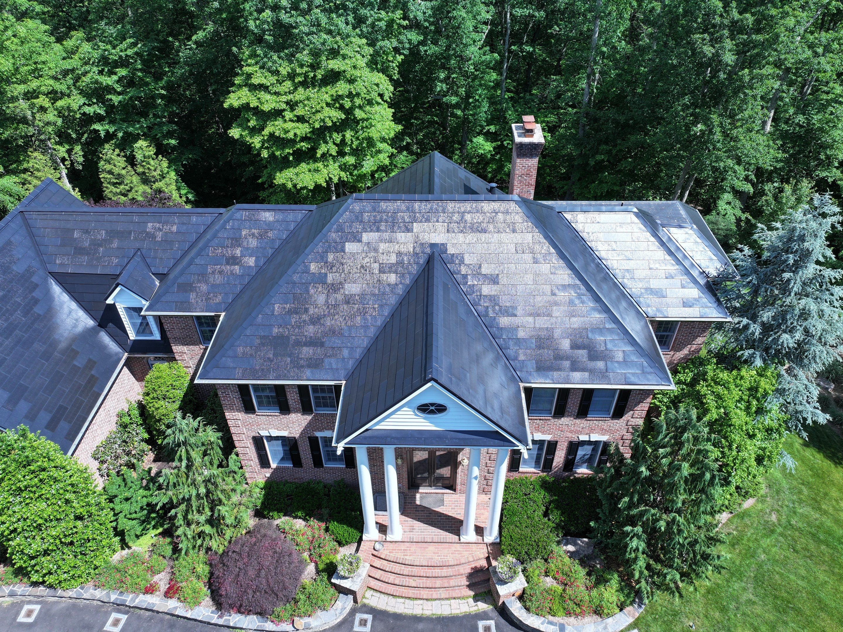 Tesla Solar Roof Replacement by American Home Contractors