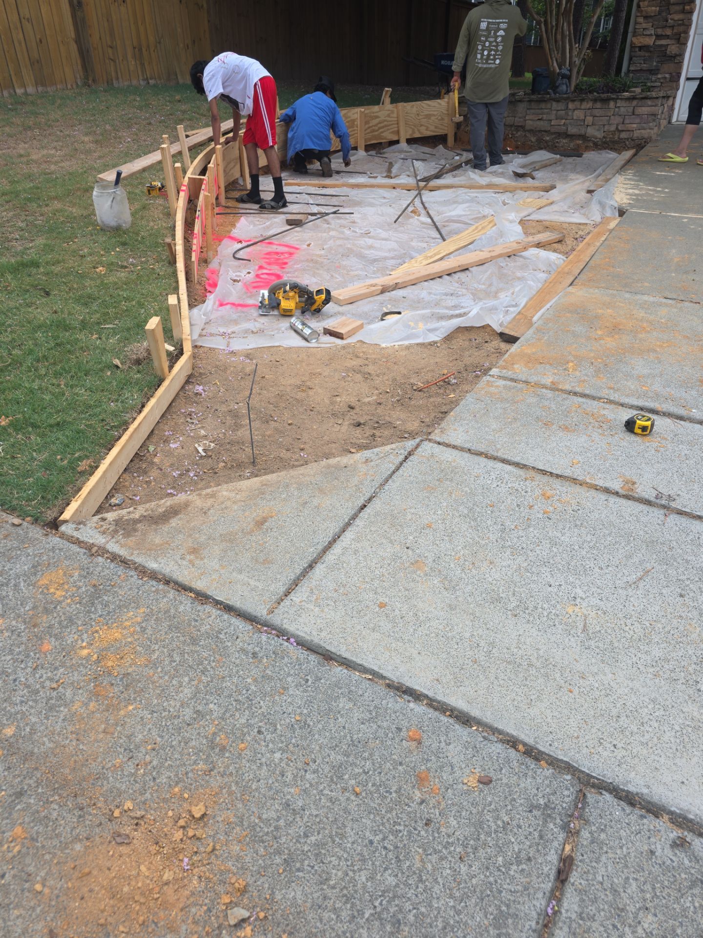 Concrete Driveway Expansion & Retaining Wall | Apex, NC by Elite Remodeling and Design LLC
