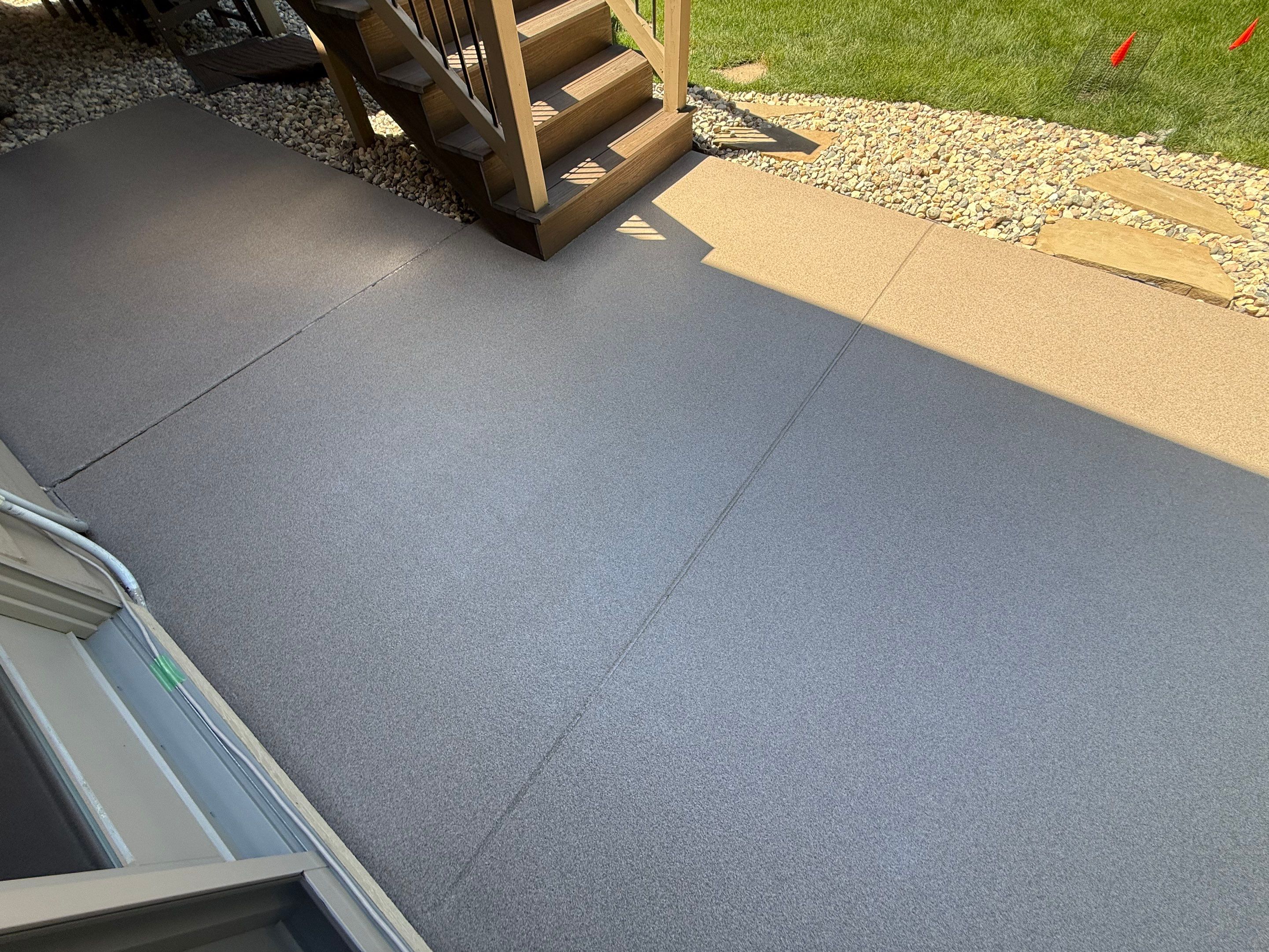 Textured Concrete Coating and Paver Patio Refresh in Sioux Falls by Select Painting, Coatings & Garage Cabinets