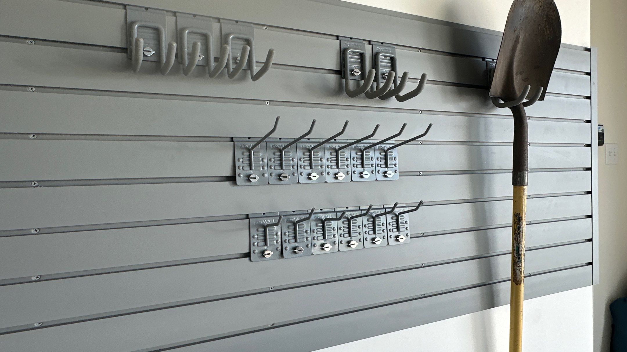 Brad V. had Slotwall and overhead racks added to his garage  by Banner Garage