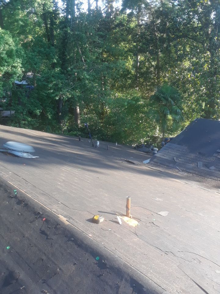 Commercial Roofing Installation using Roof Replacement by American Roofing & Construction LLC