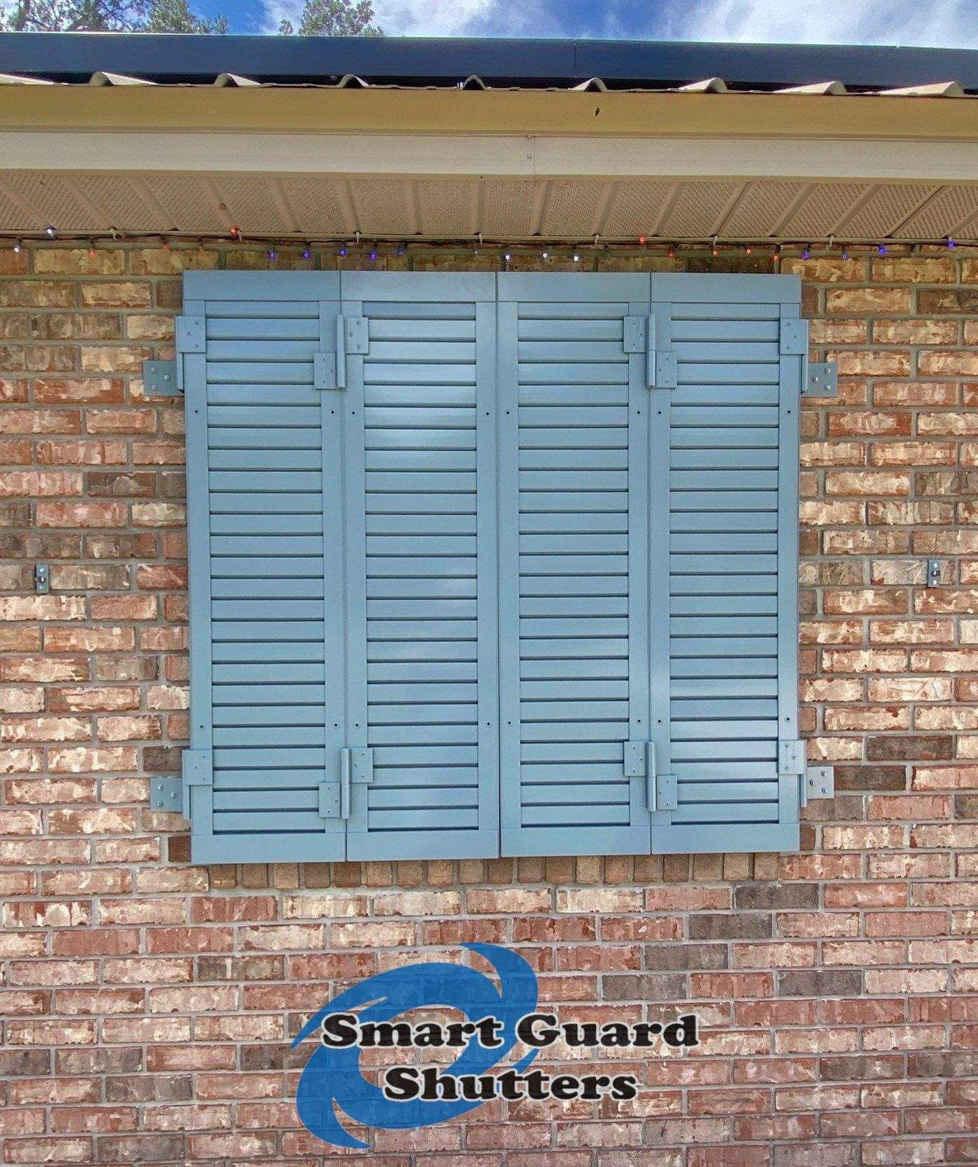 Impact Colonial Shutters in Squirrel Grey by Smart Guard Shutters