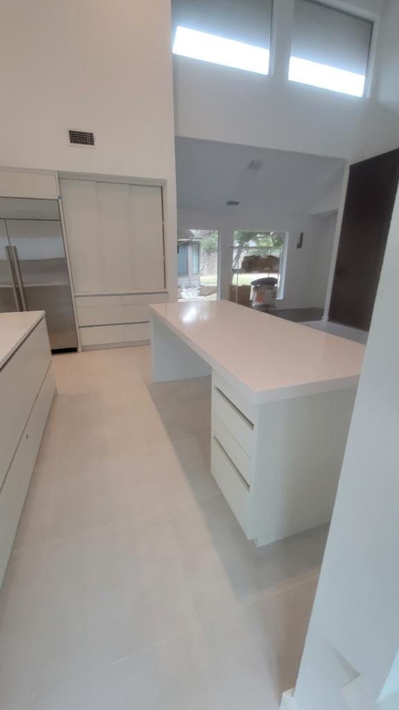 Modern & Clean Kitchen by SLM General Contractors & Roofing