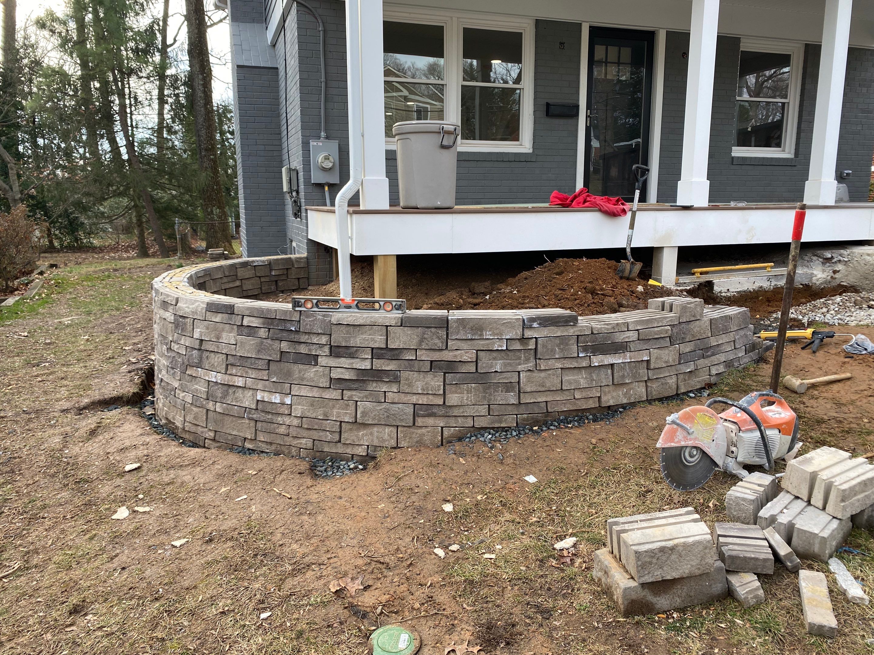 Retaining wall, walkway, small patio and landscape install by The Smet Companies, LLC
