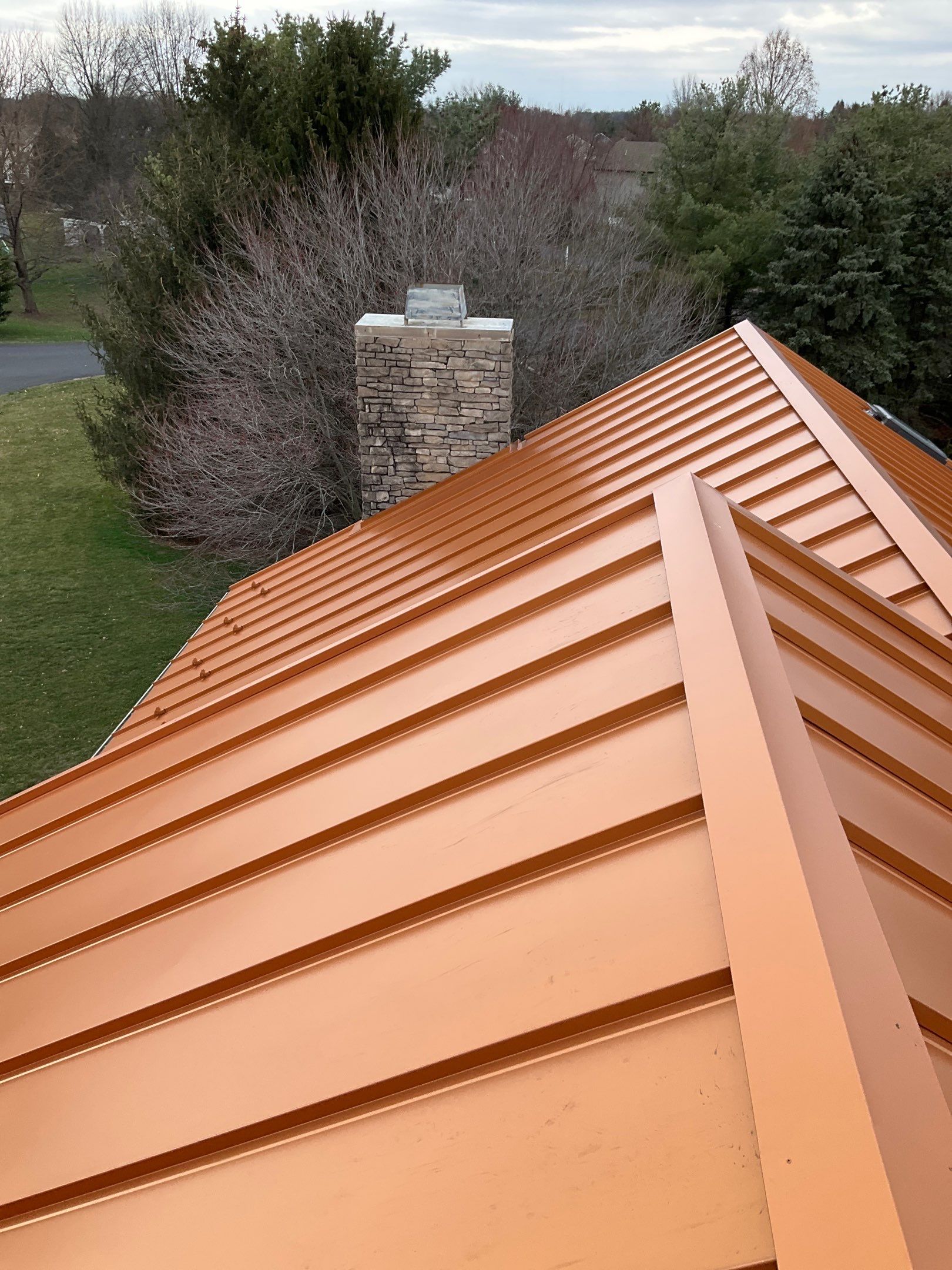 Standing Seam Roof – Copper Finish by Esh Builders