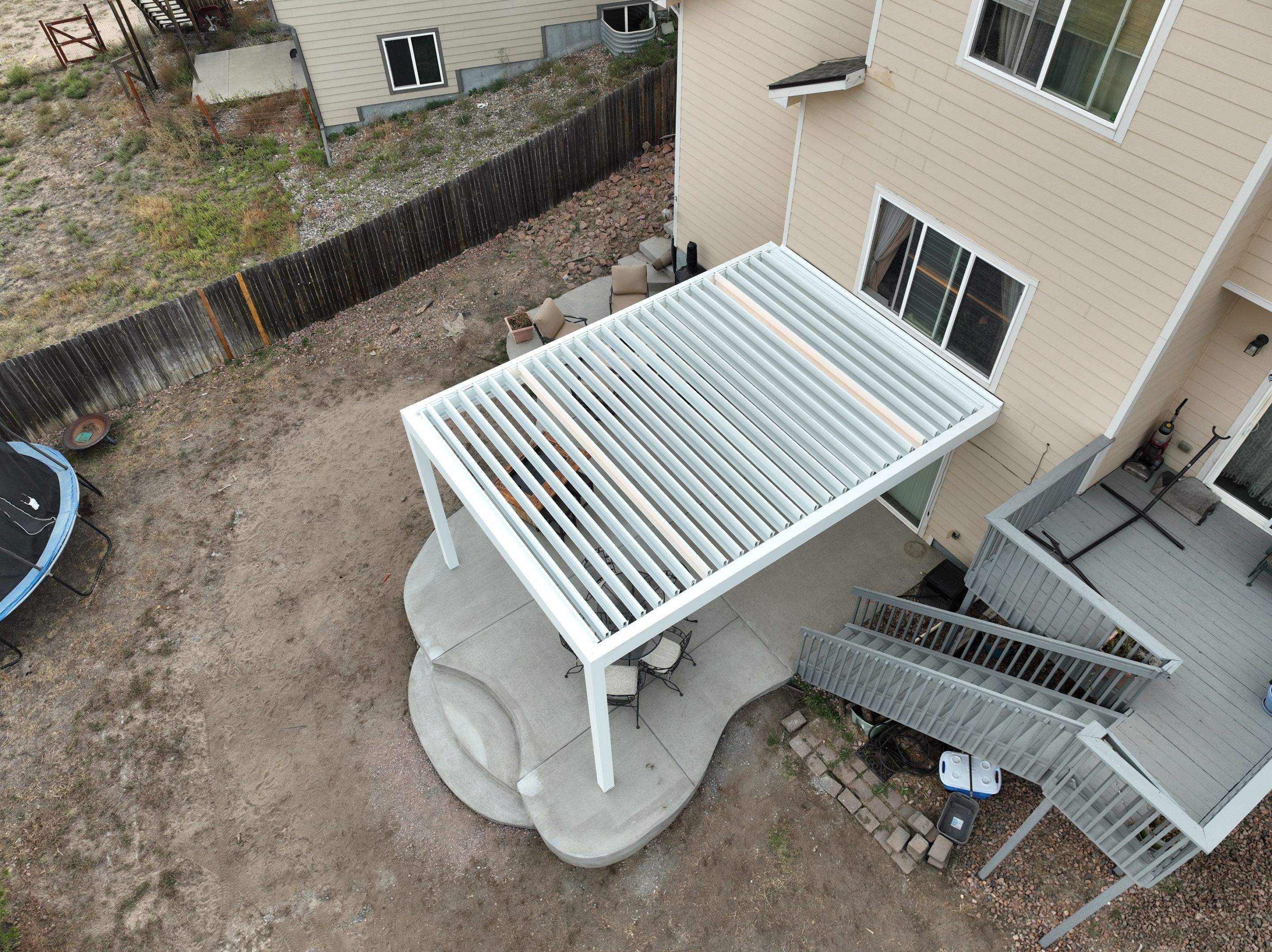 Aluminum Pergola using Progressive MagnaTrack Screens by Outdoor Solutions Colorado
