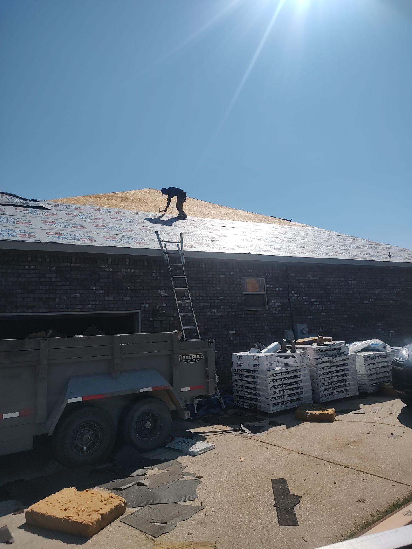 Residential Roof Replacement using ATLAS PROLAM WEATHER WOOD by Elite Roofing LLC