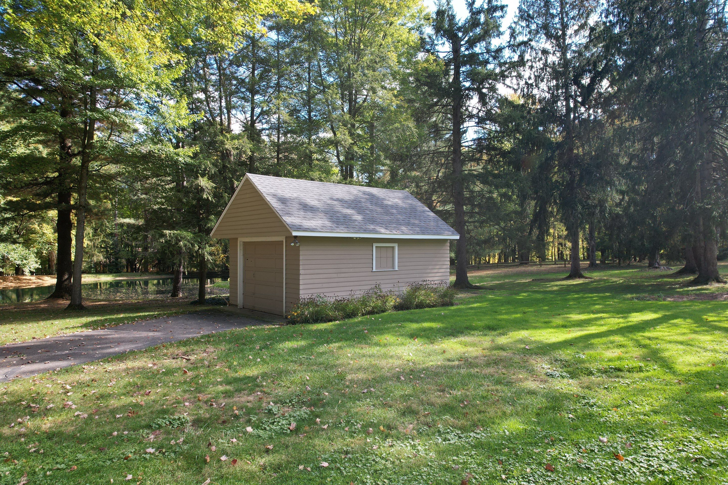 Moreland Hills Roof + Gutters Replacement by Atlas Roofing & Restoration