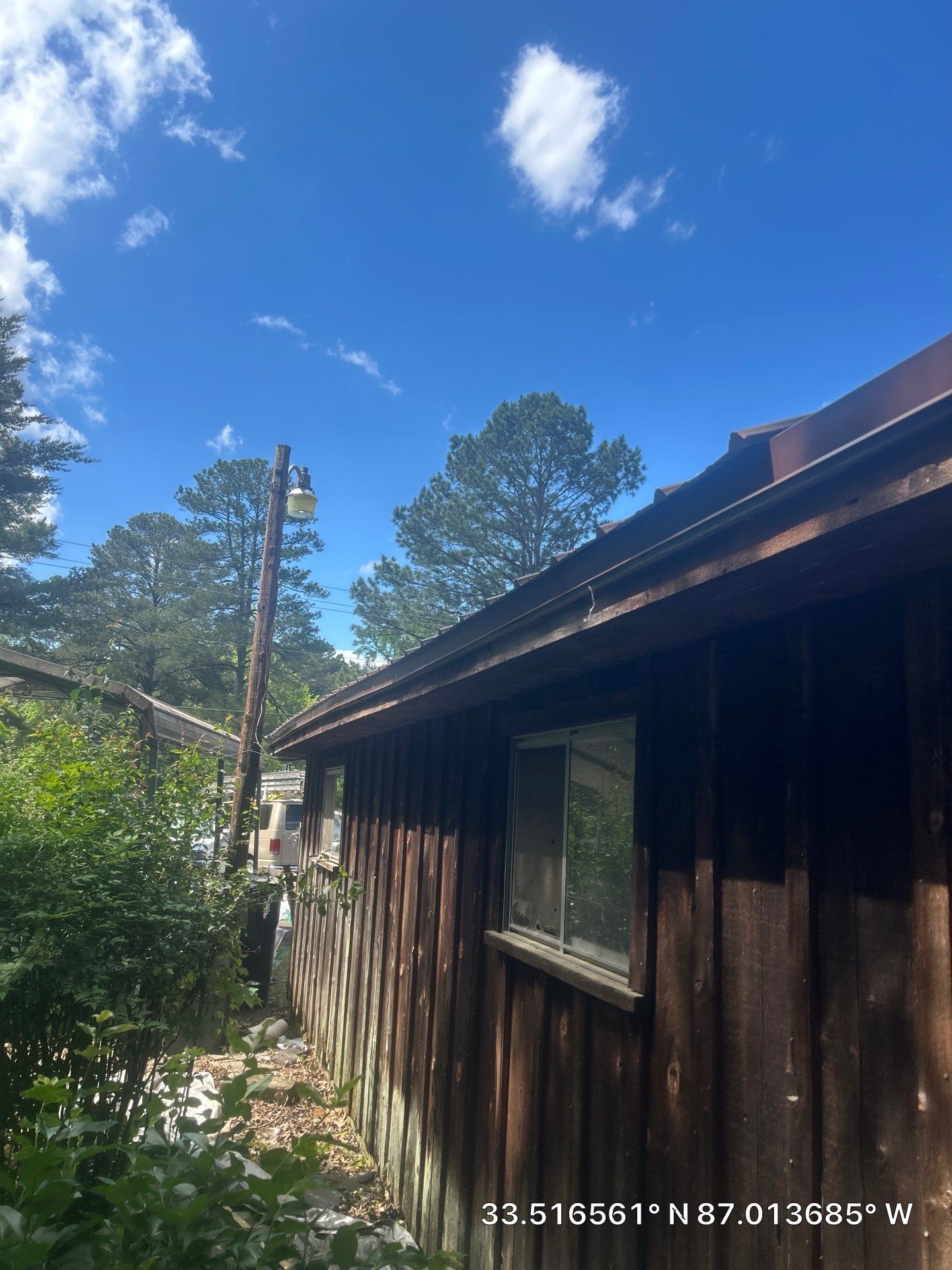 Metal Roof Replacement in Sylvan Springs (Brown) by The Roofing Dudes