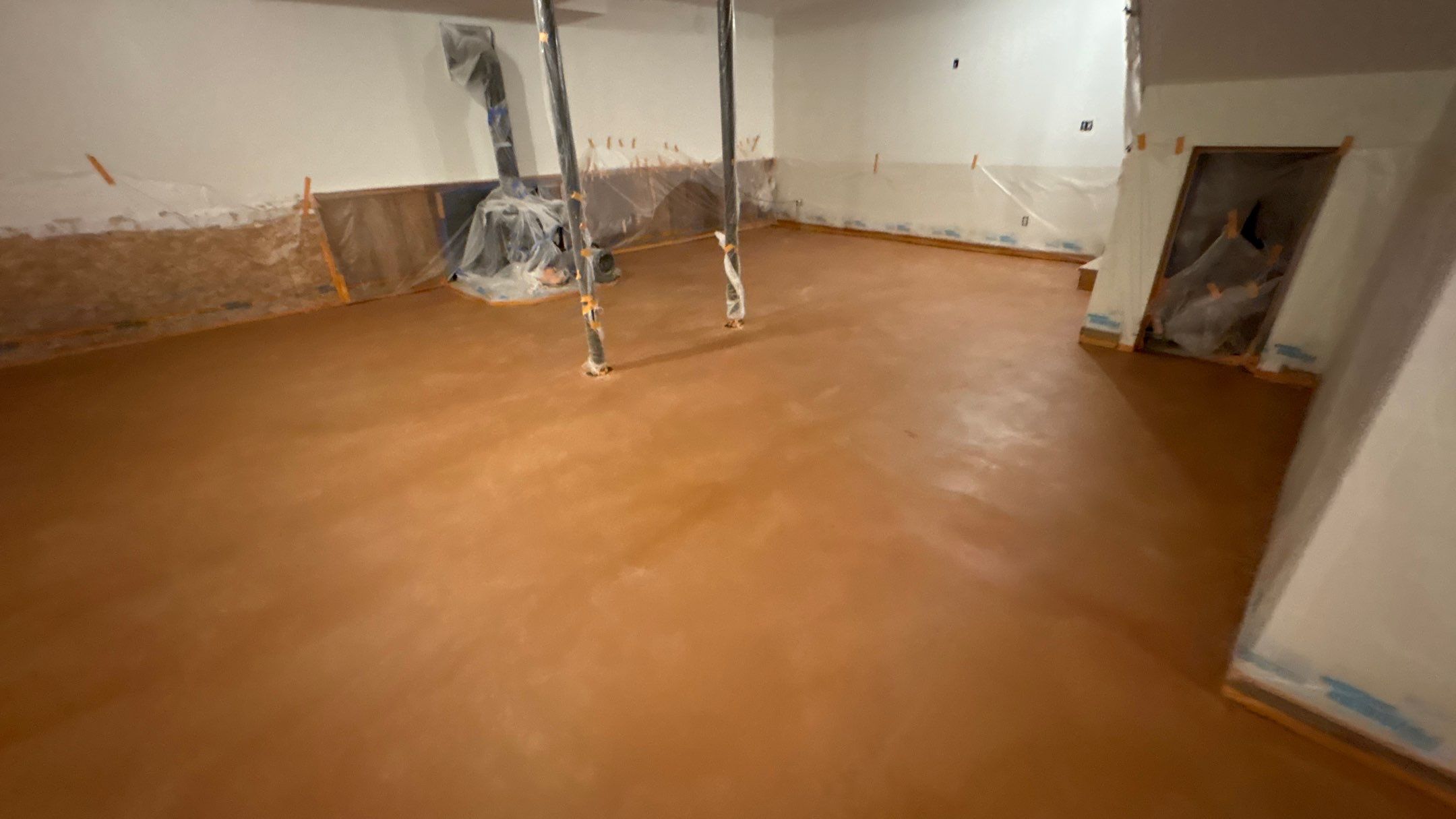 Basement Floor Remodel with Haven Reno KC by Big Red Decorative Concrete, LLC