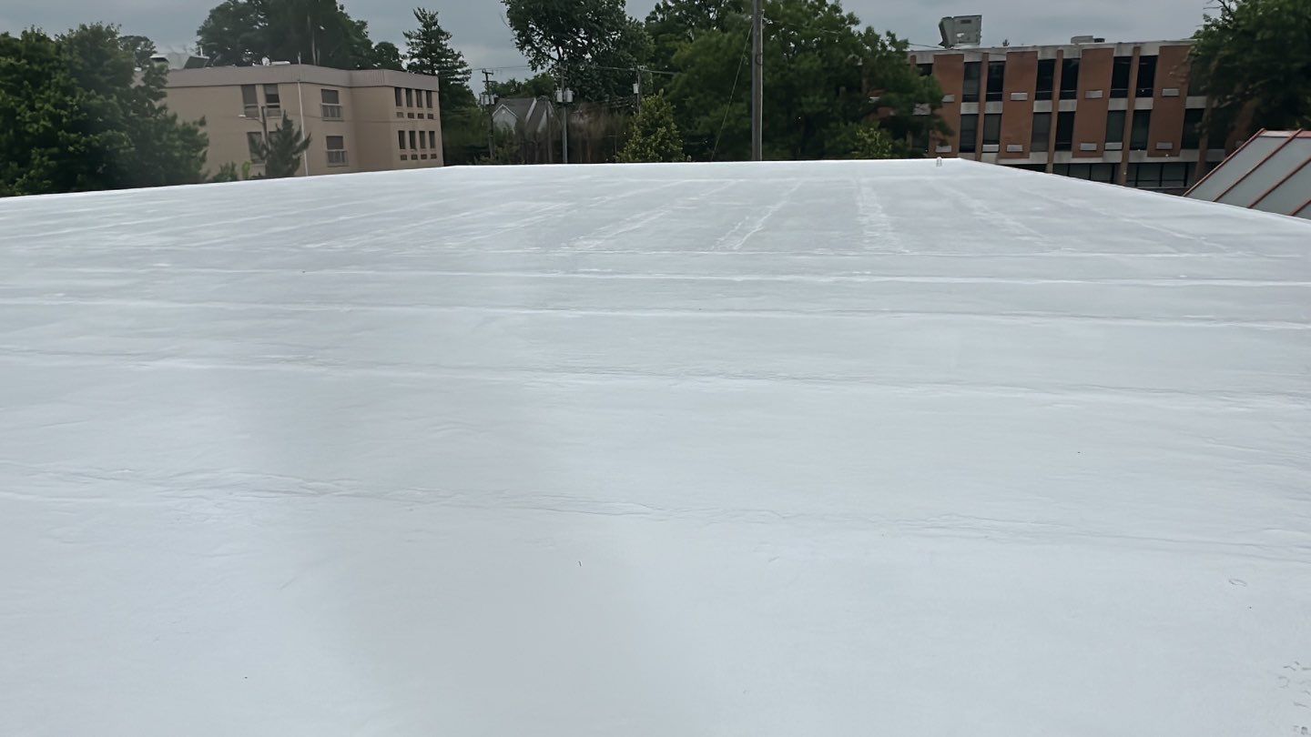 Roof Installation using Silicone TPO by ExteriorPros