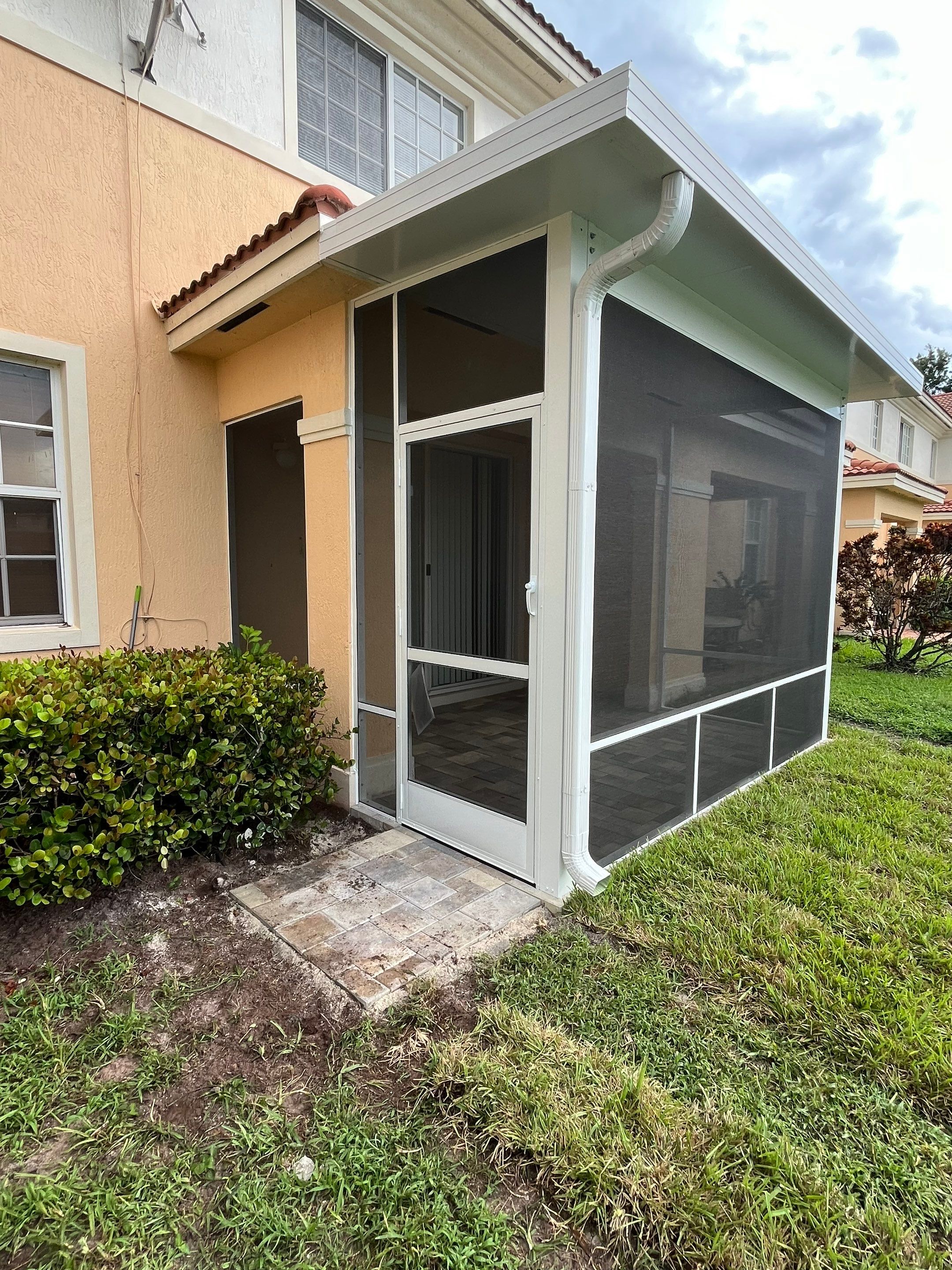 White Aluminum Screen Enclosure and Aluminum Roof Installation in Boynton Beach by The Screen Depot, Inc