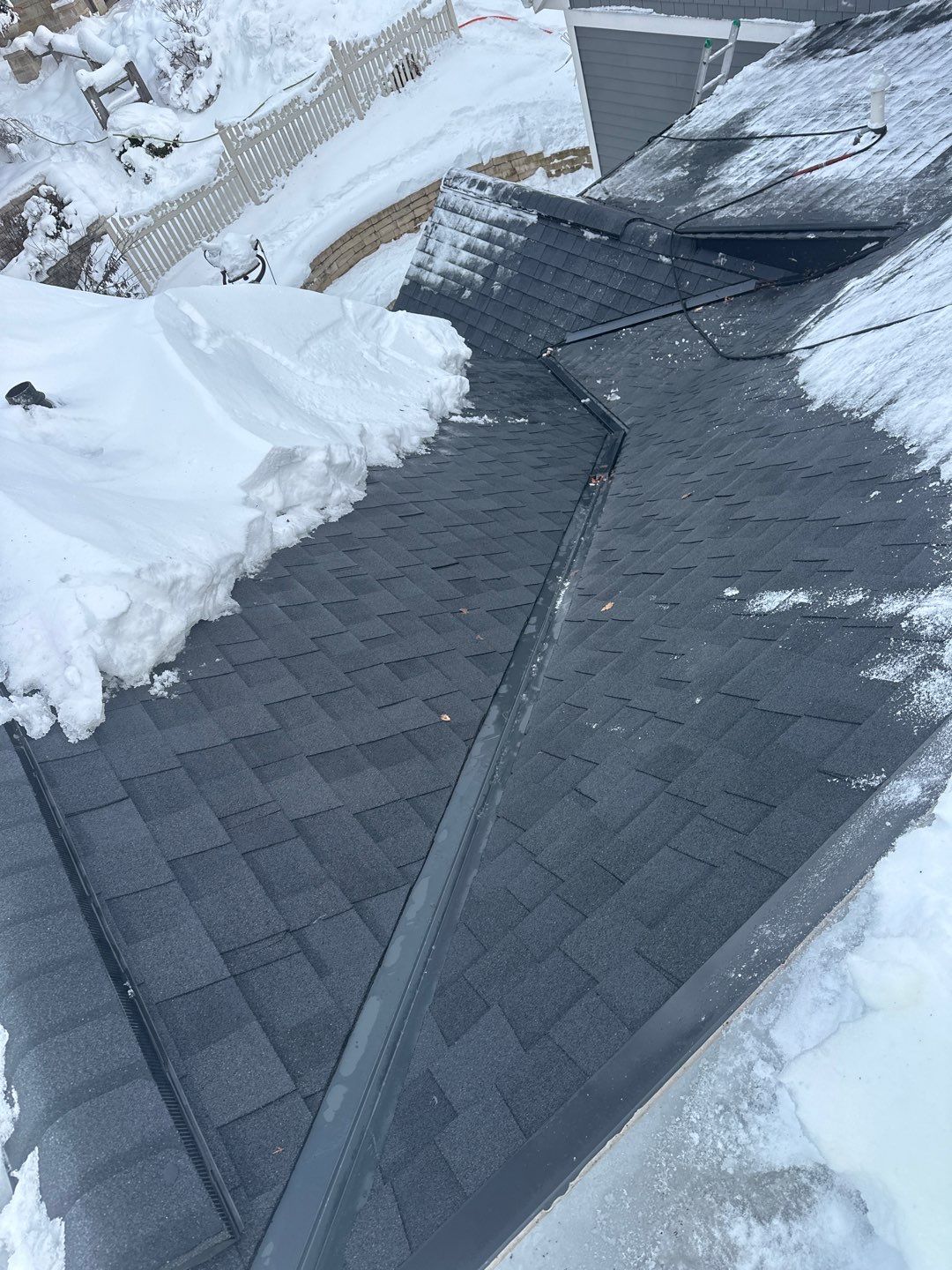 Roof Snow And Ice Dam Removal using Steamer by Total Restoration Services