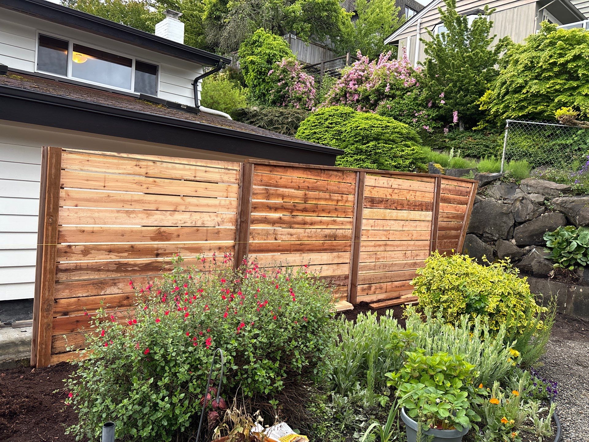 Retaining Wall & Fence Installation  by Jireh Asphalt & Concrete Inc 