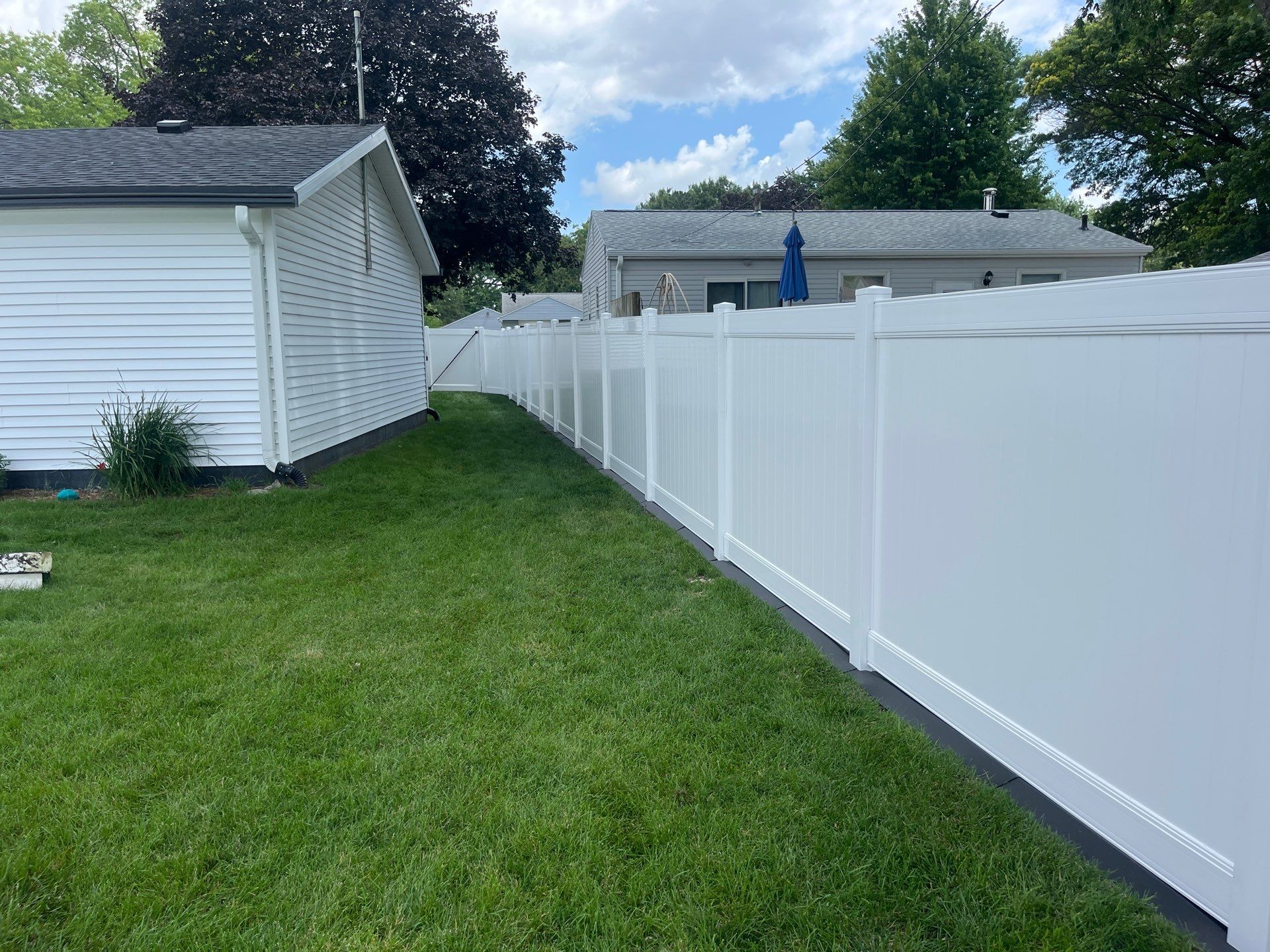 White Vinyl Privacy and Picket Fence Installation in Waterloo by Perfect Picket Fence and Stain