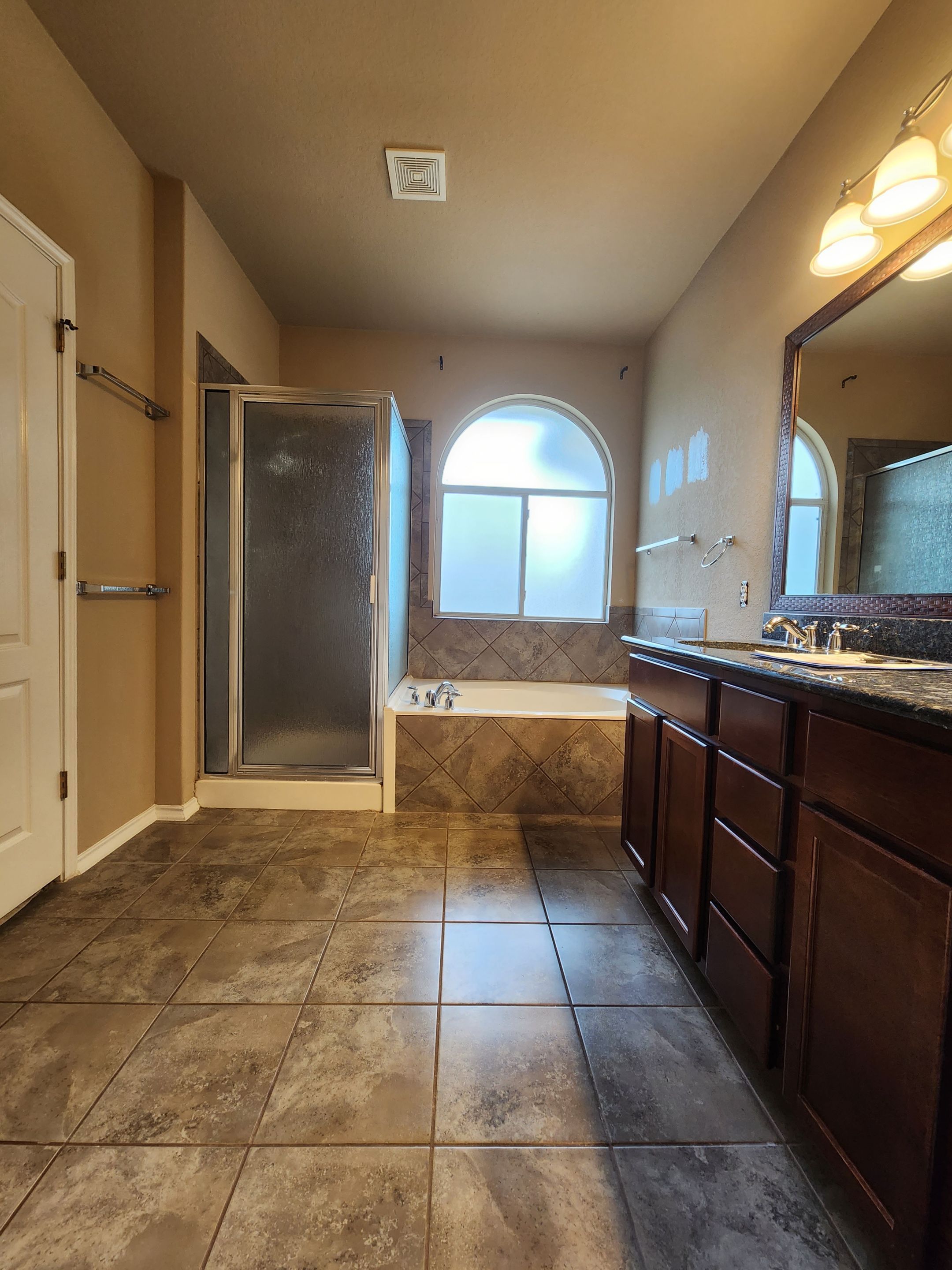 Large Walk In Shower Before and After by Legacy Bath and Kitchen 