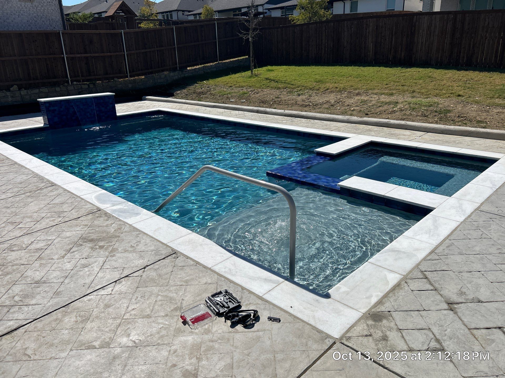 Geometric Pool with Raised Spa and Tanning Ledge by Pinnacle Pools and Spas - DFW