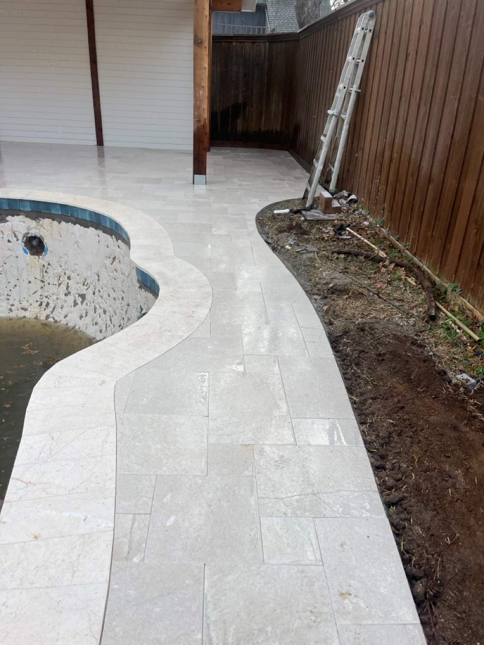 Freeform Pool Remodel with Travertine Deck and Deck Jets by Pinnacle Pools and Spas - DFW