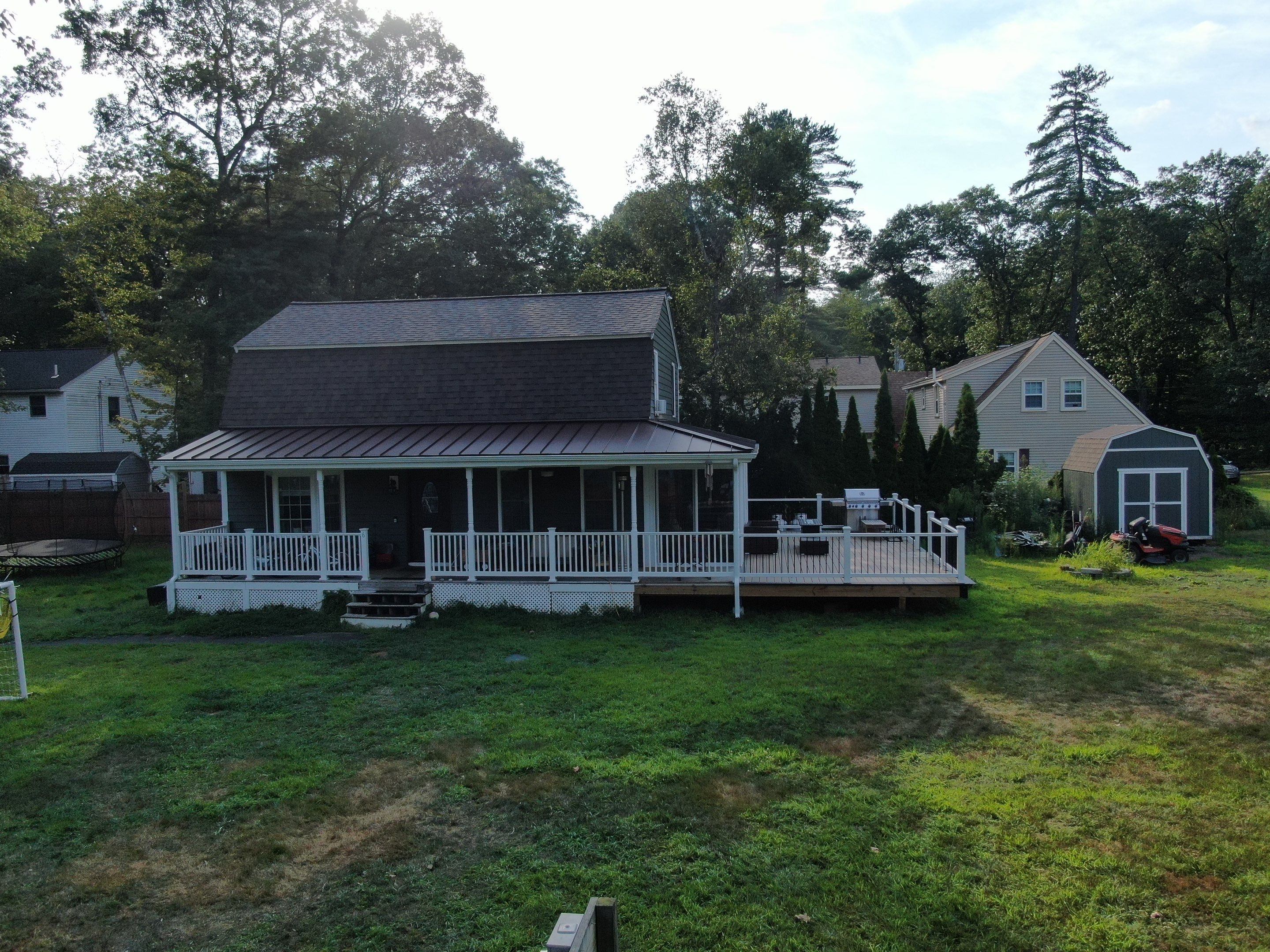 Full Roof Replacement & Farmers Porch Restoration – Asphalt + Standing Seam Metal by Mighty Dog Roofing of Greater Middlesex County