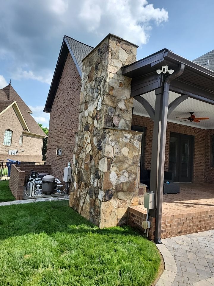 House Wash using cleaner by Power Wash Masters LLC