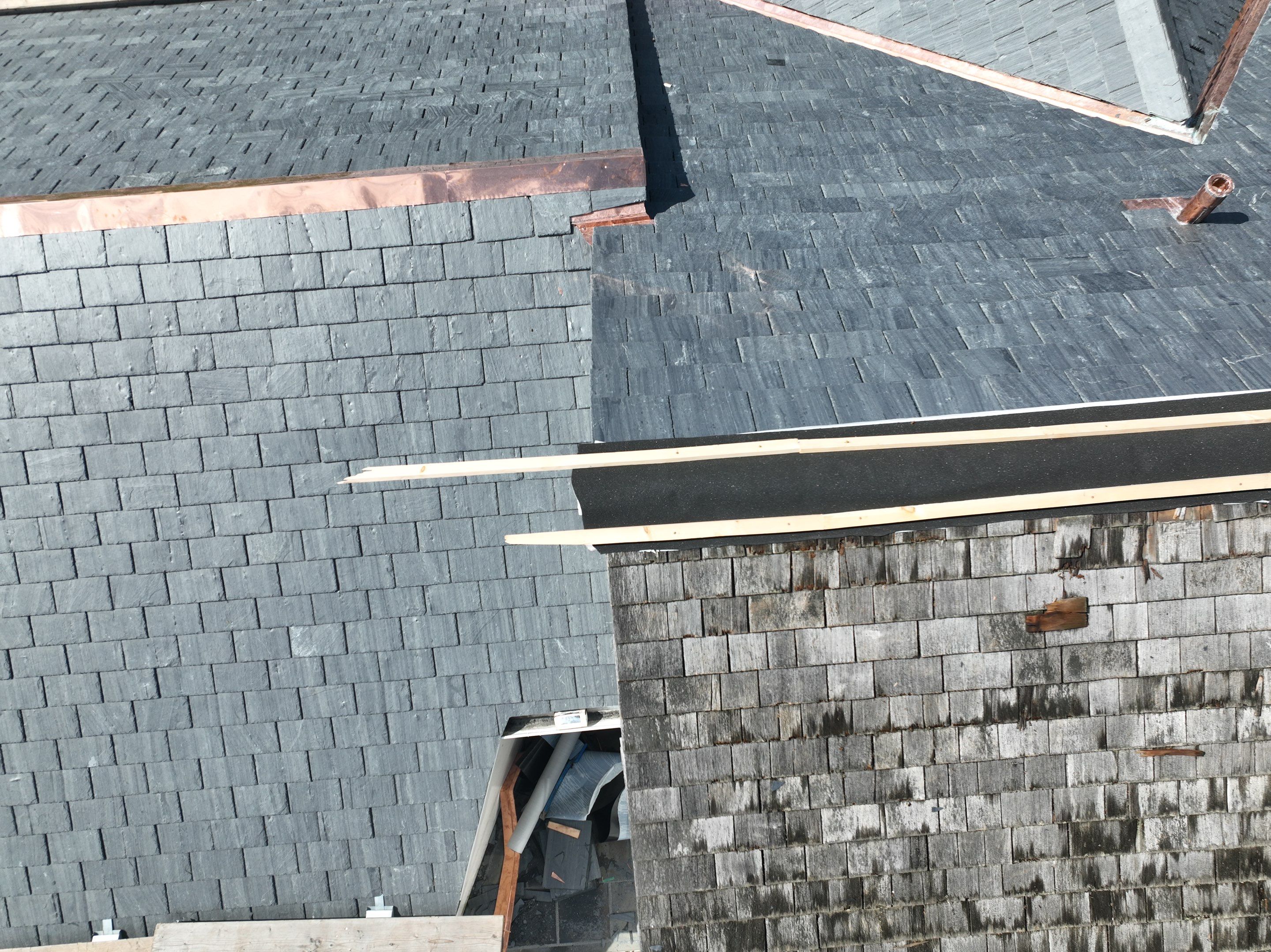 Residential Roofing Installation using Vermont Slate by A Plus Exterior