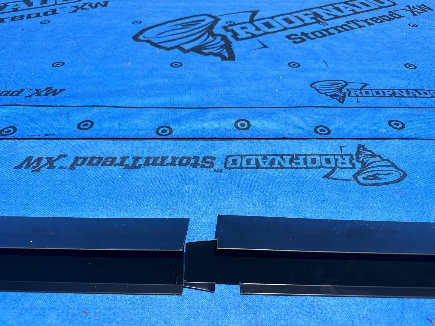 Residential ReRoofing Installation using 12" Prolok metal by Top Notch Roofing Inc