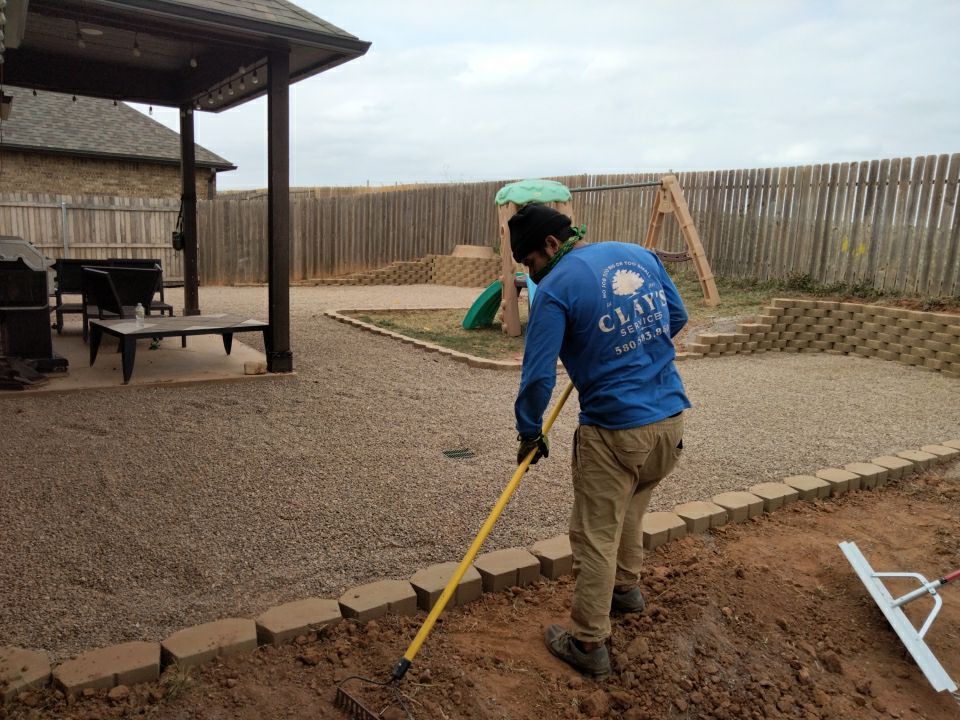 Retaining wall / Playground by Clays Services Inc