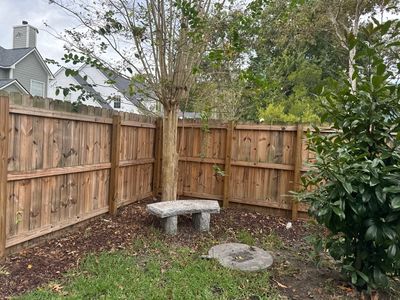 Weathered Fence and Patio using Wood Sealant and Concrete Sealant
