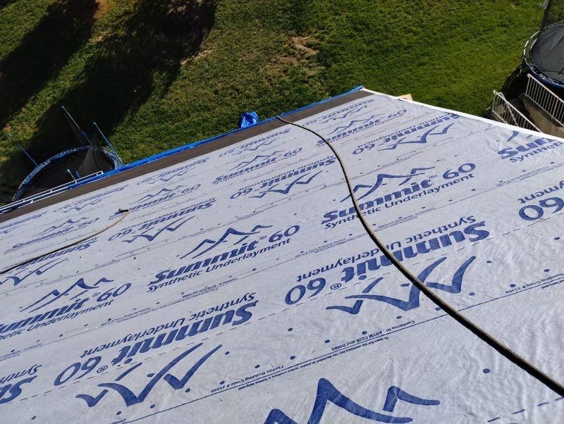 Residential Roofing Installation using Atlas Pinnacle Pristine Black Architectural Shingles by Frederick Roof Repair