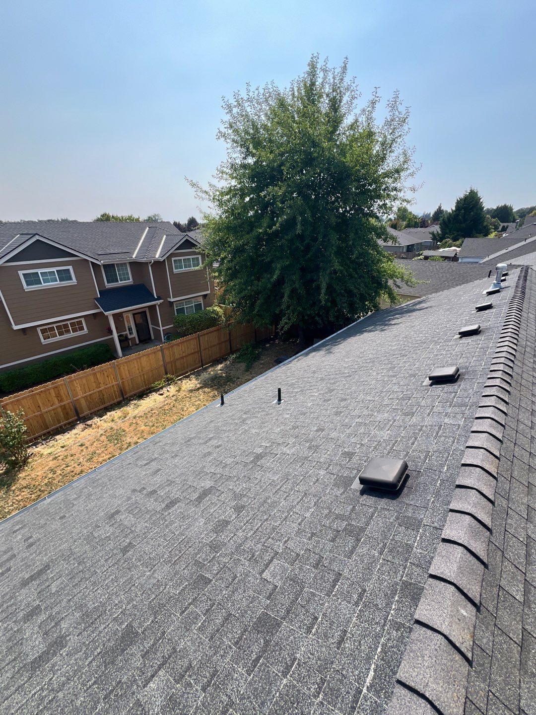 Residential Roofing Installation using IKO Dynasty (Color: Granite Black) by Orezona Building & Roofing Company, Inc.